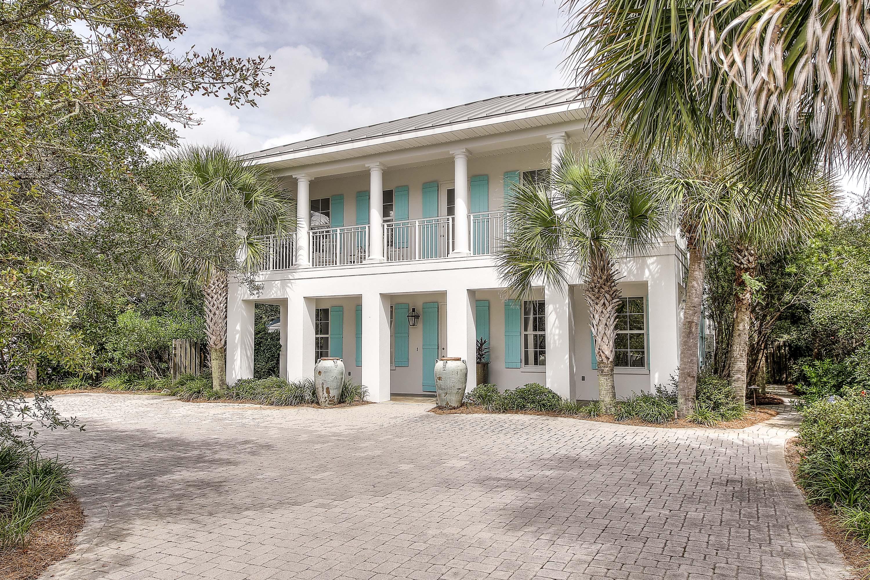 This EXCELLENT 5 Bedroom home WILL NOT LAST LONG. Complete with private pool, deeded beach access, room for carriage house, comes fully furnished (minus named exclusions), and is walking distance to Alys Beach, Kaiya, Seacrest Beach, and Rosemary Beach.
BELLE GROVE is tropical oasis that has been enjoyed by family and friends for six wonderful years. The privacy of the backyard and lush landscaping gives the property a ''Island Vacation Feel''. The large pool, fireplace, outdoor lighting, and 17 Palm trees create a ''Key West'' experience. The interior of the home has recently received decorating and remodeling upgrades by a prominent local designer. The cool aqua colors continue the relaxed coastal atmosphere. The large Kitchen and dining area that seats 22 affords that fun family space everyone enjoys. Children are drawn to the large bunk room that sleeps 8, the pool table, kids den, extra large swimming pool and yard, which provides something for everyone. The DEEDED ACCESS to the  beach is a two and half minute walk, guests the sought after convenience of an easy walk to the shore.