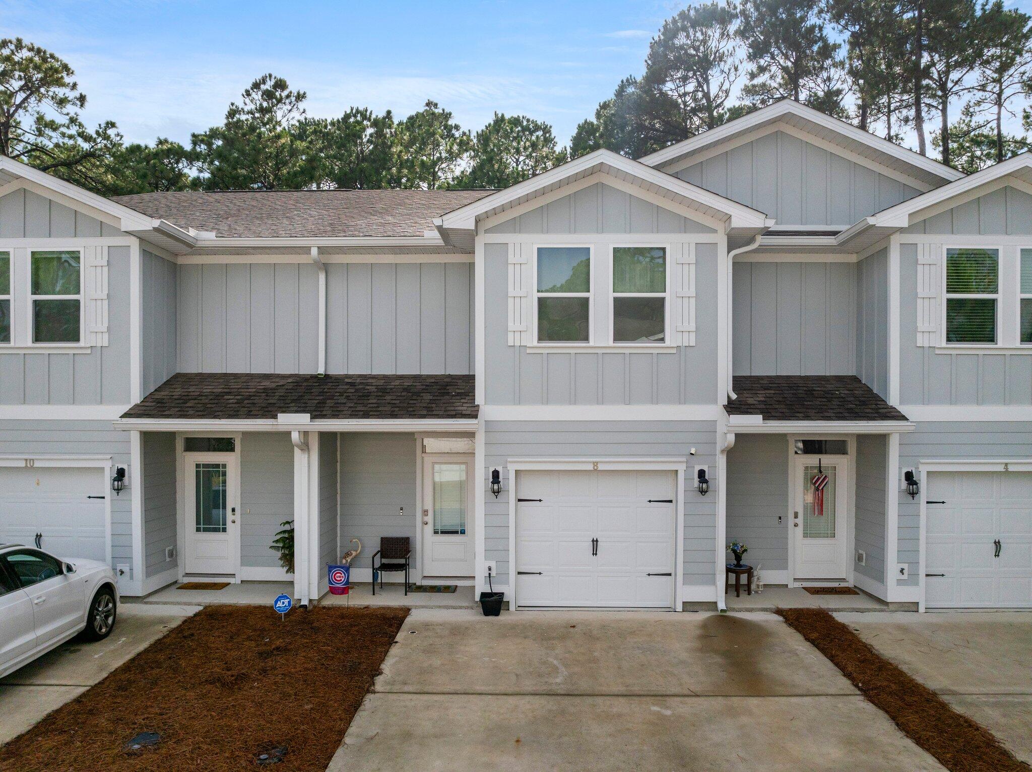 Amazing Price for your next investment property, priced well below appraised value. This townhome has a new tenant, but is for sale for an investor looking for a built in tenant. The bright and beautiful community of Sandhill Pines is located just off Mack Bayou and is just minutes to Grand Boulevard's shopping, dining, movie theater and entertainment. Close to the shopping at the farmer's market, and Topsail Hill State Park with their pristine miles of uncrowded beaches is just down the road, and offering the peaceful, clear emerald waters and soft white sand our area is famous for, with room to spread out that can be lacking in so many of Walton County's more crowded public beach accesses. Sandhill Pines allows both long term and short term rentals making it a perfect fit for an investo r as well as a homeowner. The HOA fees do include Insurance on the exterior of the units, and if you've priced insurance lately you know how expensive that can be. It's good to have an association paying this in your fees, and working to always get a better deal. Also included is the ground keeping, trash and the master association. This 3 bed 2.5 bath townhome has EVP flooring throughout the first floor and often requested carpeting on the second floor, giving the bedrooms a warm, cozy feel while downstairs you have a more open, beachy concept. The stylish kitchen includes granite countertops, white shaker style cabinetry with brushed nickel hardware, and a long breakfast bar with plenty of room for seating. Take this opportunity to own in the sought-after Santa Rosa Beach area.