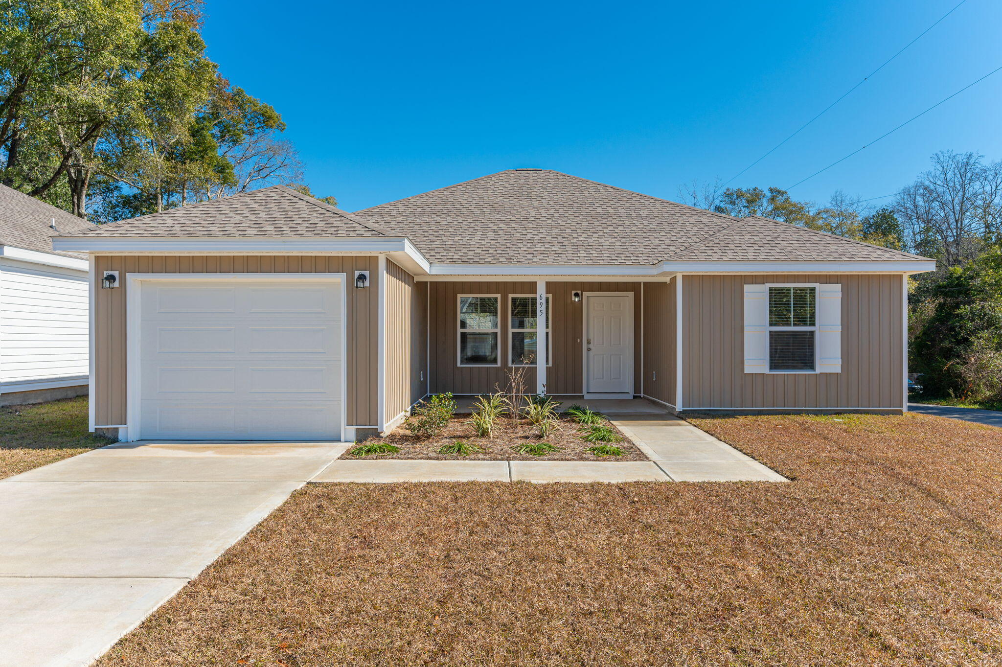 Captivating 3/2 new construction for lease! This charming home on a corner lot near DeFuniak's historic district offers over 1200 sq ft of cozy living space. It is an ideal blend of modern comfort and classic charm. Don't miss out on this opportunity to call it home!
Pets are on a case-by-case basis. Credit score must be a minimum of 600. Household income must be 2.5 times the lease amount.