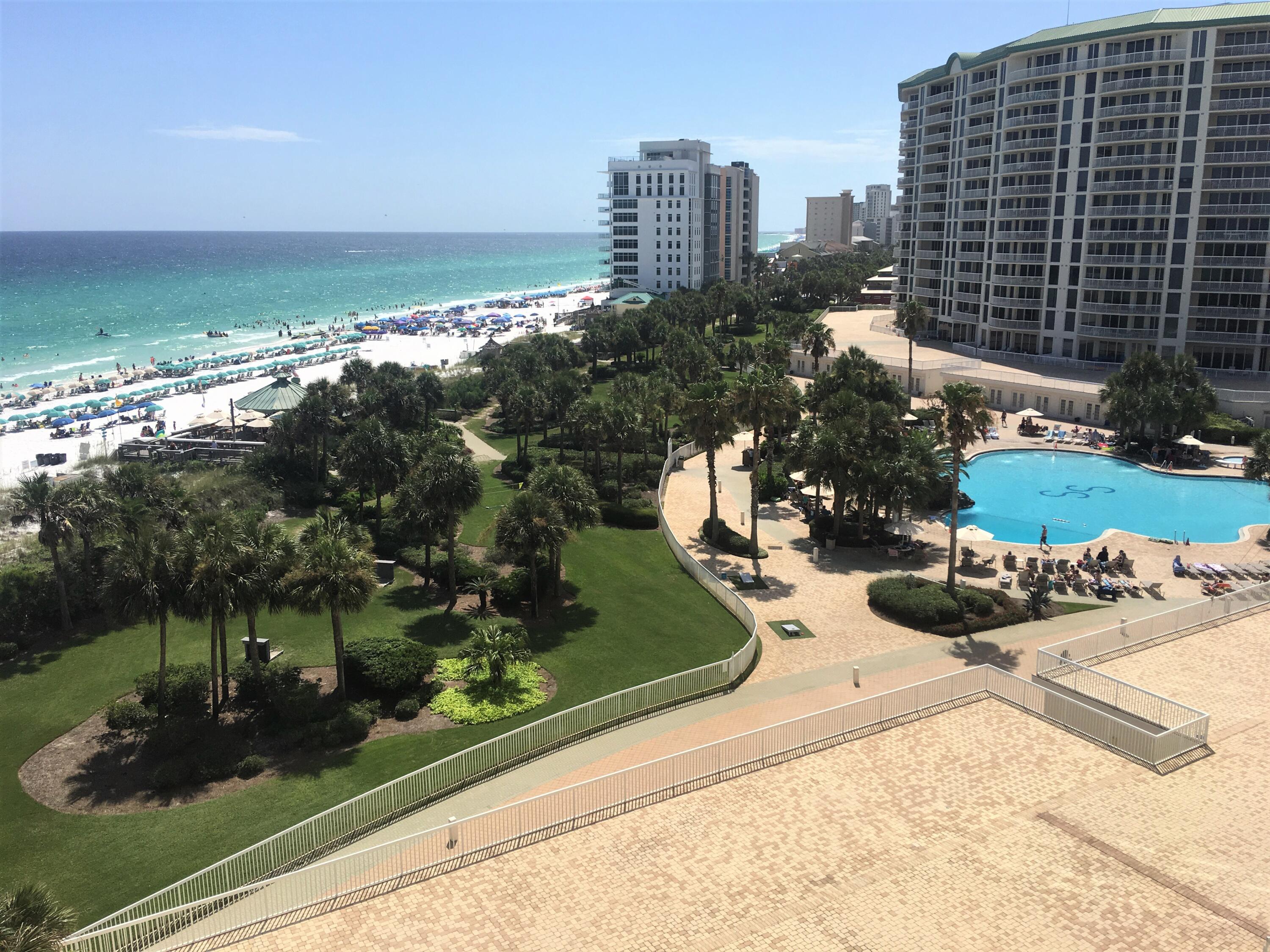 This lovely condo is your ticket to the fabulous beach lifestyle.  Take in the expansive views of the beautiful beach and emerald water from the spacious balcony. Semi-private elevator into the foyer. 
Open floor plan with great flow.  Walk in closets. Many fun restaurants and attractions in the area. 2nd and 3rd bedroom share a balcony on the North side with views of the dunes. Buyer to verify all information.