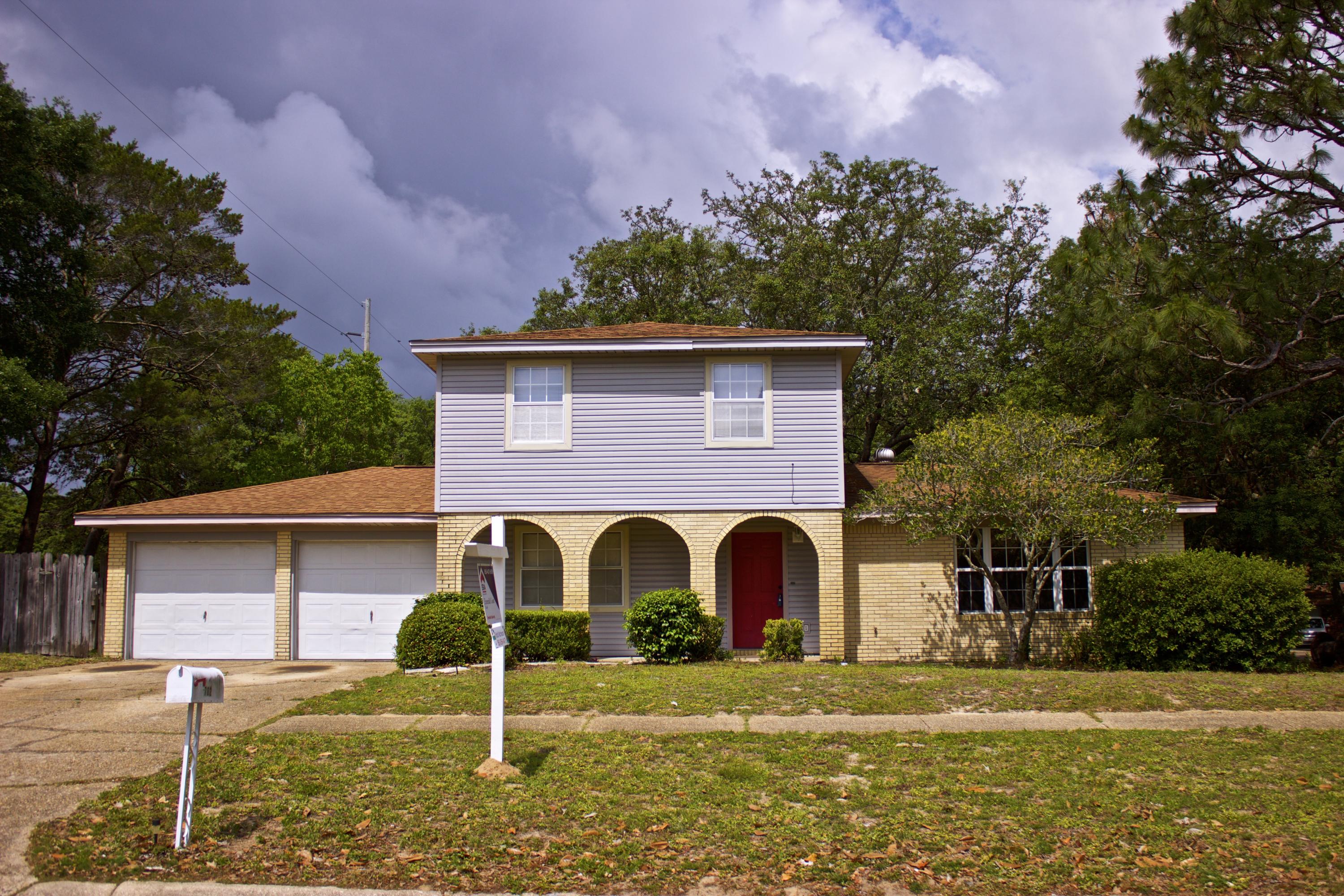 Welcome home! This spacious 2 story home sits on a large over sized corner lot with a privacy fenced back yard. When you step into the house you enter into a large foyer with a large dining room to your left and the living room to your right. The home features a large eat in kitchen that opens to your backyard. Your master suite is located upstairs along with 2 guest bedrooms and a bathroom. Downstairs you have a large bonus room that can be used as a 4th bedroom that can be converted into a expansive master suite. Conveniently located to shopping, base, and the minutes from the emerald coast water and white sands. Don't let this one get away.