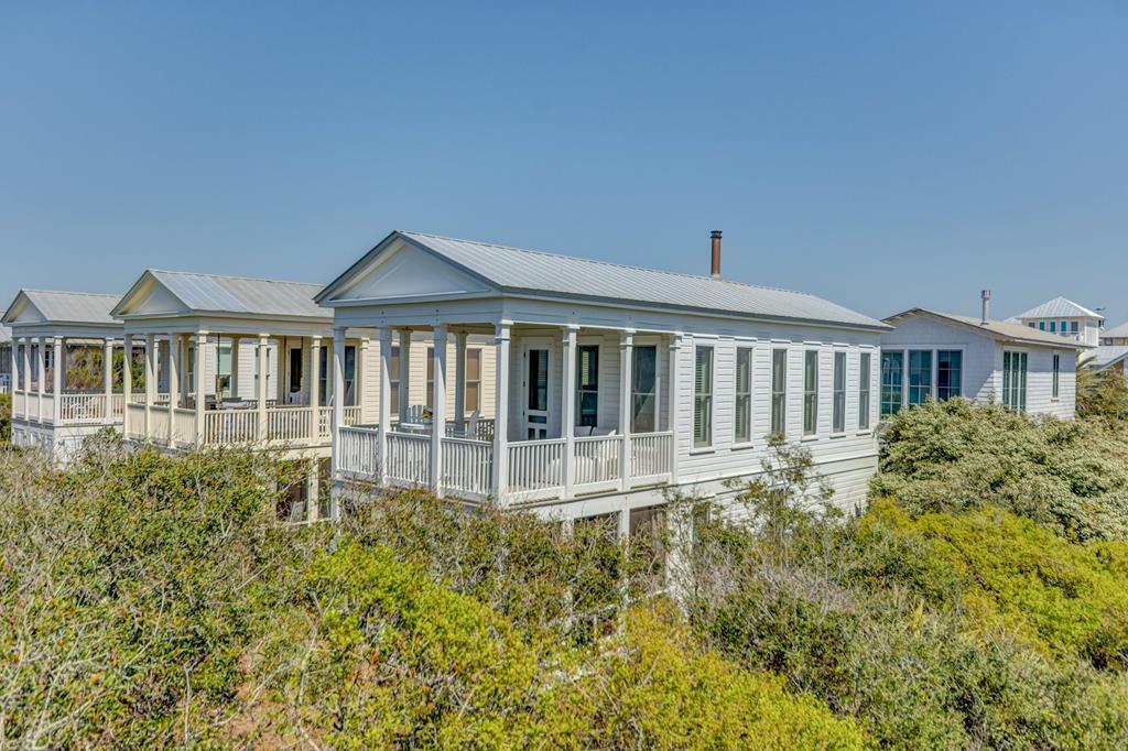 The Honeymoon cottages are uniquely Seaside Florida and this is no exception.  Set on the largest of the cottage lots immediately next to the Pensacola Beach Pavilion, town and the beach are in easy reach for family fun and a romantic getaway.

Always solid vacation rental performers, this cottage is available for your consideration.