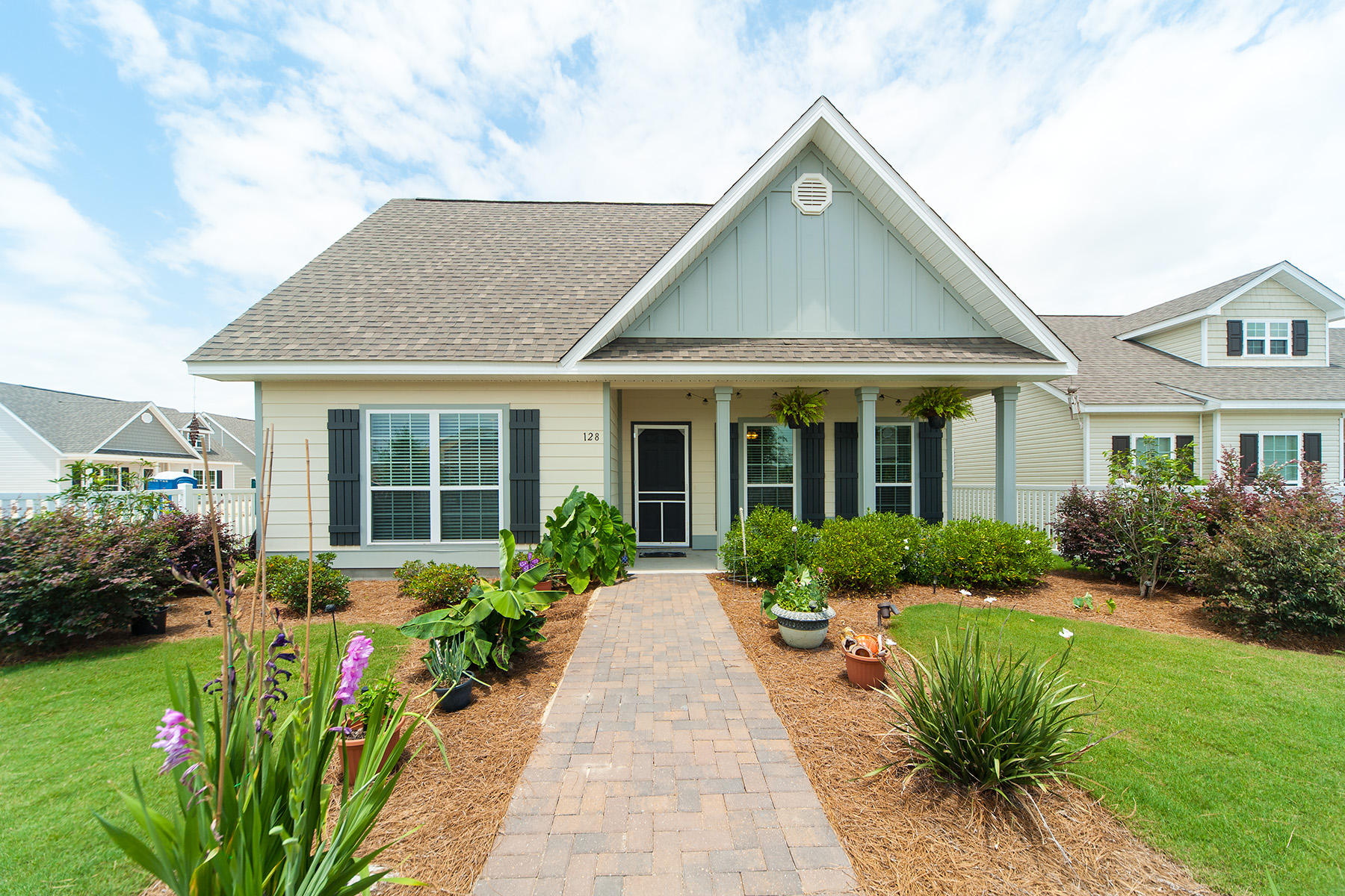 Located in the Schooner Landing neighborhood, this home is walking distance to the Hammock Bay amenities center. This corner lot, fenced yard comes complete with lawn maintenance so that you may spend your time enjoying the amenities instead of mowing the lawn. Interior space includes three bedrooms, two bathrooms, open living concept with beautiful wood flooring and upgraded kitchen with granite countertops. The exterior is reminiscent of the Southern craftsman style with a large porch on the front of home. A two car garage, entry from the rear of the home provides security and extra storage. HOA, Garbage, Basic Cable and lawn maintenance included.
Hammock Bay is a pedestrian-friendly development. There are network of sidewalks, nature trails, and bike paths. The Hammock Bay Town Square-lawn-style amphitheater is designed for entertainment. There is also a $12+ million, 60-acre Sports Park featuring a multitude of ball field/park amenities nearby.  Recently the developer donated land for two schools to be built in Hammock Bay.

The Lake Club at Hammock Bay includes a 25 meter lap pool and a resort-style pool, lighted tennis courts, putting green, $250,000 playground, lighted basketball courts, meeting/functions facility, caterer's kitchen, and 6000 sq. ft. clubhouse with movie theatre.  Adjacent to the Lake Club is the Fitness Club at Hammock Bay, a 4000 sq. ft. state-of-the-art fitness facility featuring Body Master Weight equipment and Life Fitness cardiovascular equipment w/flat screen TV's.  There is also the Bay Pavilion at Hammock Bay, located on 480 ft. of shoreline alongside the Choctawhatchee Bay.  

Hammock Bay offers a pet park entitled Canine Commons at Hammock Bay. This pet park provides an outdoor doggy-washing station and drinking-bubblers.  Hammock Bay is currently one of 600+ communities in the United States that features the most advanced fiber optics technology direct to homes through Centurylink's FTTP (Fiber To The Premise) program, providing capacity for the latest advances in phone, internet, and cable technology.  Hammock Bay is located in a Community District Development to ensure the highest quality of infrastructure for years to come. We invite you to come take a tour of this exceptional home and experience first-hand the Hammock Bay "way of life!"