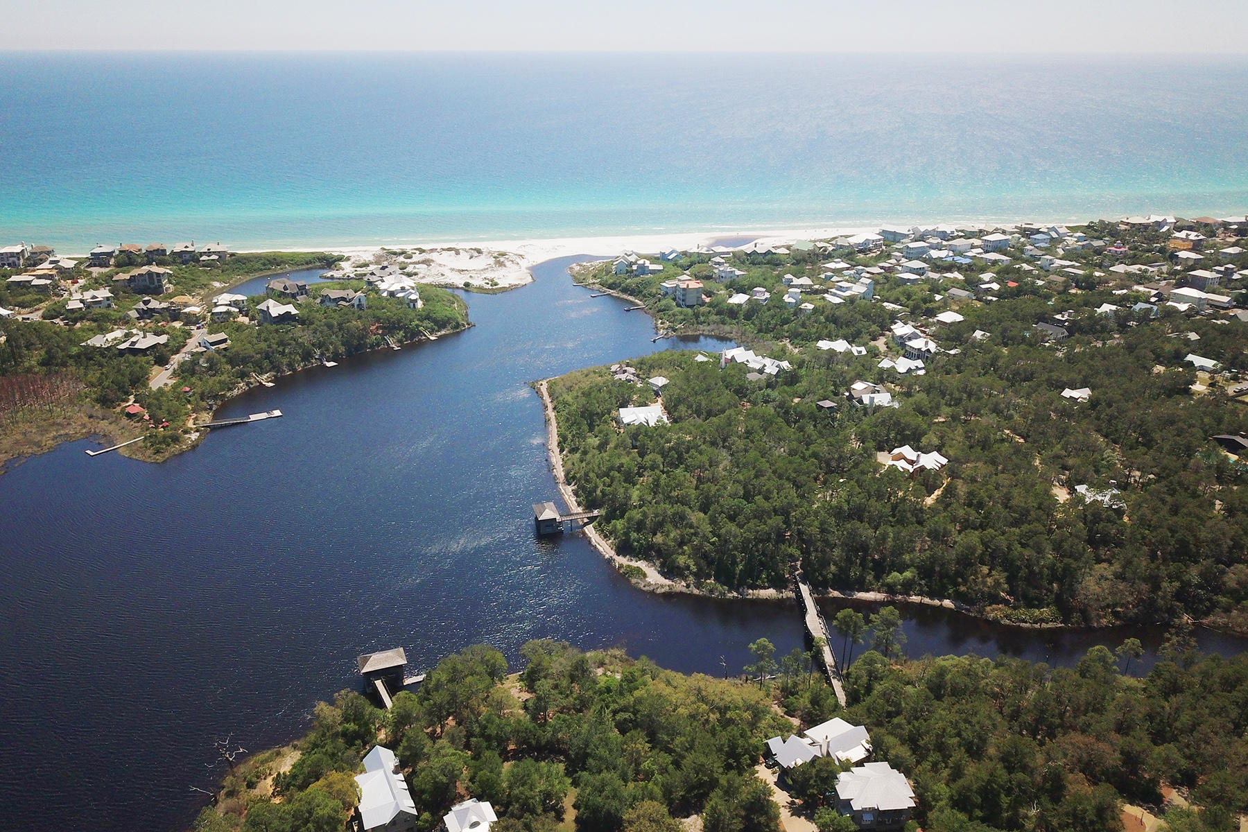 Spend the day lounging in the private community pool, paddling on a rare coastal dune lake or take a short stroll to the nearby butterfly park. Located in the exclusive gated community of Draper Lake Coastal Village, this homesite is nestled on the eastern peninsula, just a short distance to Draper lake and the Gulf of Mexico. Known for its charming architecture and laid back way of life, the private community of Draper Lake embraces the coastal lifestyle that 30A has to offer.
Residents can build a 2-story, Type 1 beach house with impressive views and enjoy all of the luxury amenities that Draper Lake has to offer. Community amenities include beach access, two community boathouses and two upscale pools. Residents are also just a short walk to Draper Lake and a 40-foot observation towe