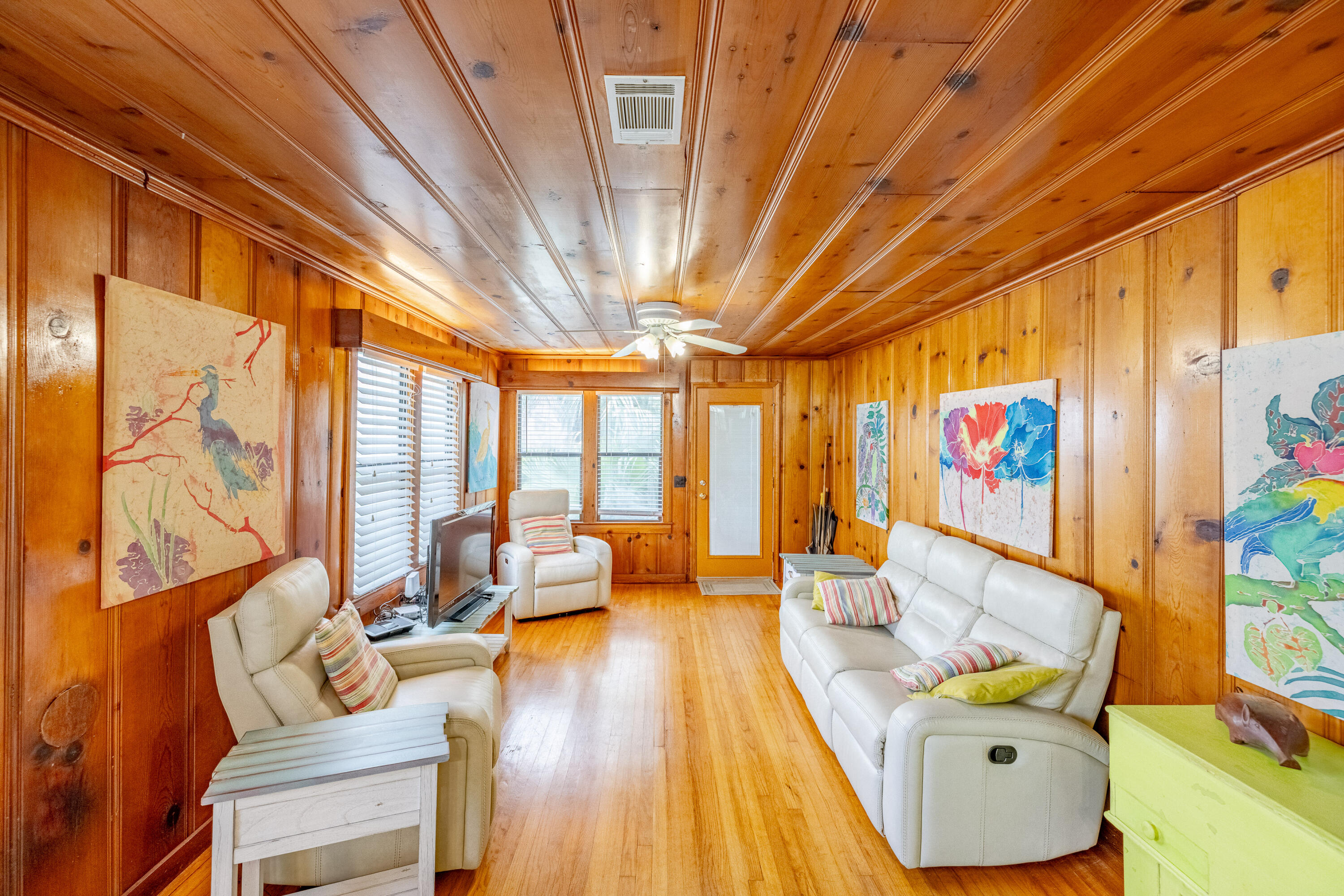 This charming Bid A Wee Beach residence, reminiscent of a vintage dollhouse, is ideally situated just two blocks from deeded beach access. Built in the 1950s, this beach cottage exudes character with its knotty pine paneling and offers a delightful living experience. Step inside to discover an inviting open floor plan, complemented by the allure of wrap-around decking that provides a perfect spot for relaxation. The property boasts a spacious 50x143 lot, providing ample space for a potential pool, along with lush landscaping, a shed & a convenient circular driveway. Rich in Old Florida charm, the home has been thoughtfully updated to preserve its nostalgic atmosphere. The location is truly exceptional, as the golf cart-friendly community grants easy access to Pier Park (SEE ADD. REMARKS) Carillon Beach, and the 30A corridor to the West, offering a wide range of entertainment options. The pristine beach is just a few hundred feet away, completing the coastal lifestyle.

Don't miss the opportunity to experience the enchantment of this blast-from-the-past home firsthand. Come and explore the unique charm and timeless appeal of this incredible property - you'll be glad you did.