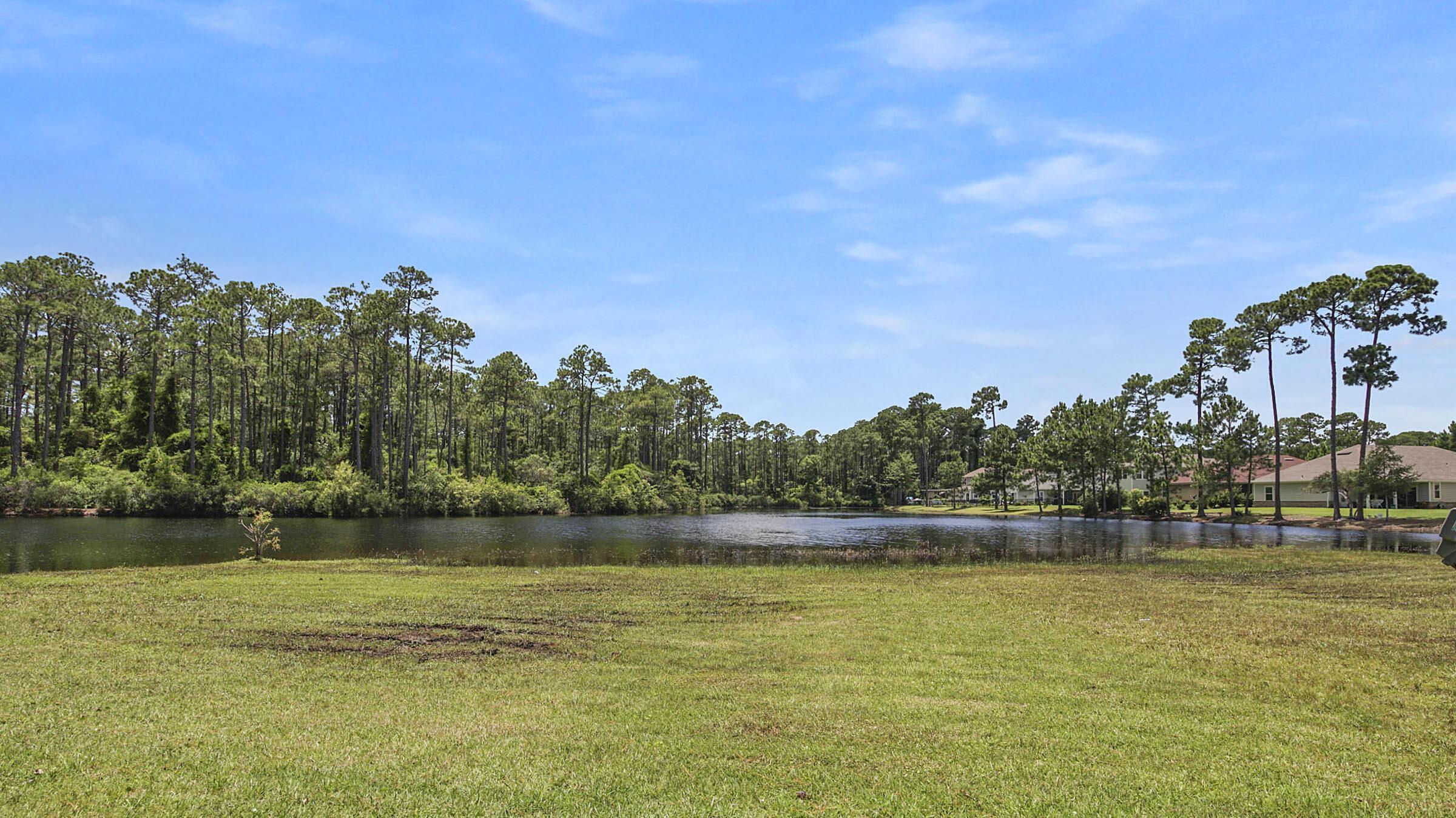 5/3 home on lake, community pool and a park. Master bedroom 2nd floor. Extra Large Kitchen with loads of cabinets. 2 car garage, oversize parking. Close to hospital, shopping, beaches.