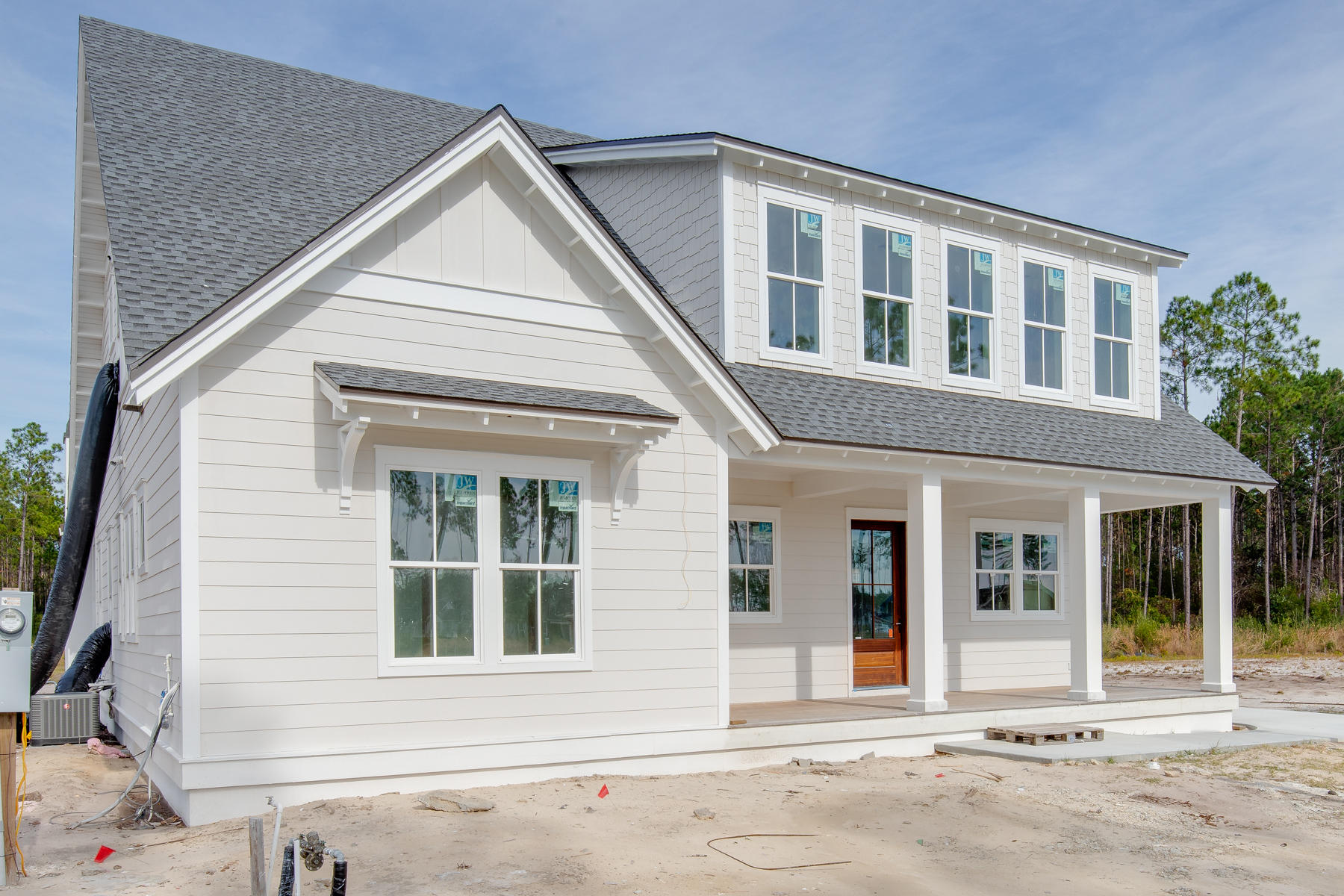 This exquisite new residence from Dune Construction in the Watersound Origins community will offer nearly 3,200 square feet of living space, 4 bedrooms, 4.5 bathrooms, detached two-car garage, covered cabana complete with gas fireplace, and an in-ground pool. A classic coastal style defines this spacious home featuring open living spaces, a fully-equipped gourmet kitchen with 36'' Wolf cooktop, sub zero refrigerator, white quartz countertops, and 10' ceilings throughout the first story. First floor also includes Venetian plaster fireplace, an elegant master suite and two large covered porches. The second story is a haven for children or guests with three bedrooms with ensuite bathrooms and a secondary living area. Enjoy upscale finishes throughout paired with high quality construction designed to withstand the elements. Meticulously planned to offer a relaxed lifestyle environment, the Watersound Origins community is located near all of the activities of South Walton including beaches, shopping and dining. Amenities include parks, walking trails, lake access, a resort style swimming pool, an events lawn and the Watersound CafÃ© open for breakfast and lunch. Origins Golf Club is a six-hole regulation short course located within the community that also plays as a nine-hole executive course or a 10-hole, par-3 layout.