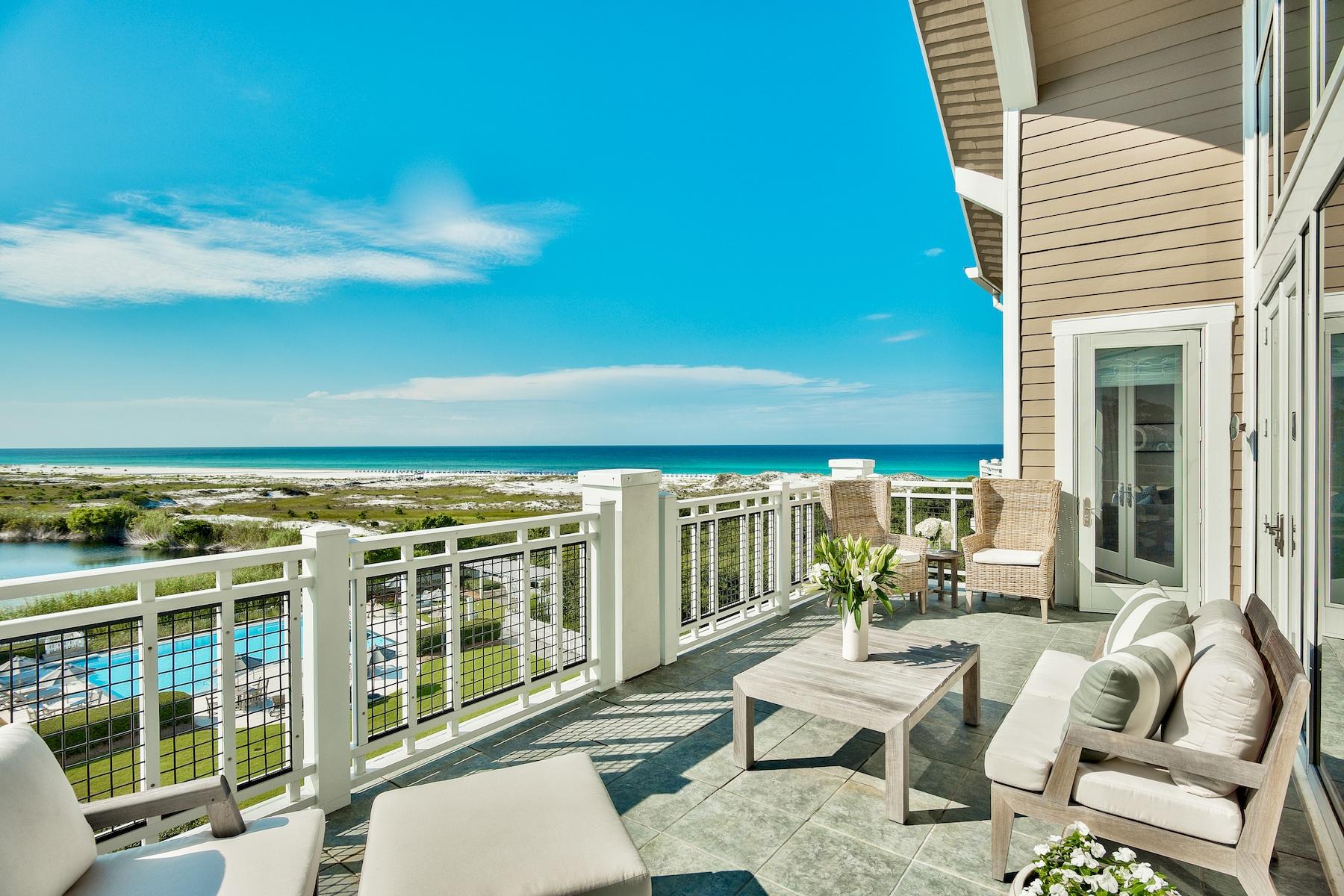 Watersound Beach is a serene community in a prime beachfront location, and this top floor unit provides a wonderful home for enjoying all that it has to offer. The far-reaching, ever-changing gulf and coastal dune lake views are best enjoyed from the generous balcony, welcoming the morning breeze or toasting the sunset with cocktails at dusk. Indoors, this exquisite 2,177 square feet, 3 bed, 3.5 bath condo is equally delightful. The bright and airy living room has 24-foot-high ceilings and equally impressive double-height windows framing glorious coastal views. It's a room to linger in, relax, read and entertain friends. French doors open onto the terrace, providing seamless indoor-outdoor living in the Florida sunshine. The kitchen is designed for culinary inspiration with stainless appliances and breakfast bar seating that allows for casual dining and hanging out with the chef. Days pass gently, filled with walks along the pristine shoreline and blue-green waters of Watersound Beach. Deviate off along trails and boardwalks that meander through wind-sculpted dunes with waving sea oats. The on-site amenities of Watersound Beach include four sparkling swimming pools, a 12-hole putting green, fully equipped fitness center, and a poolside cafe for catching up with neighborhood news.