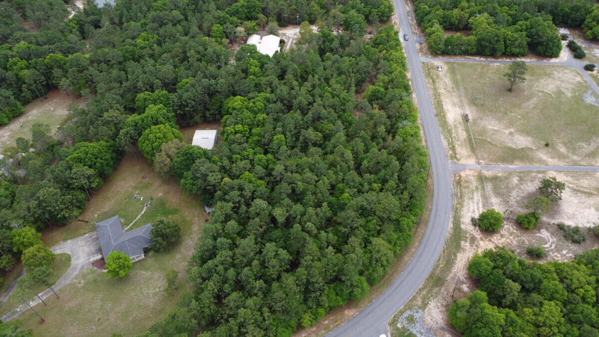 Welcome to this amazing 2.11 acre vacant land located in the beautiful city of Crestview, Florida. This property offers a unique opportunity to own a piece of land in a prime location with public water access, making it the perfect place to build your dream home or invest for the future!