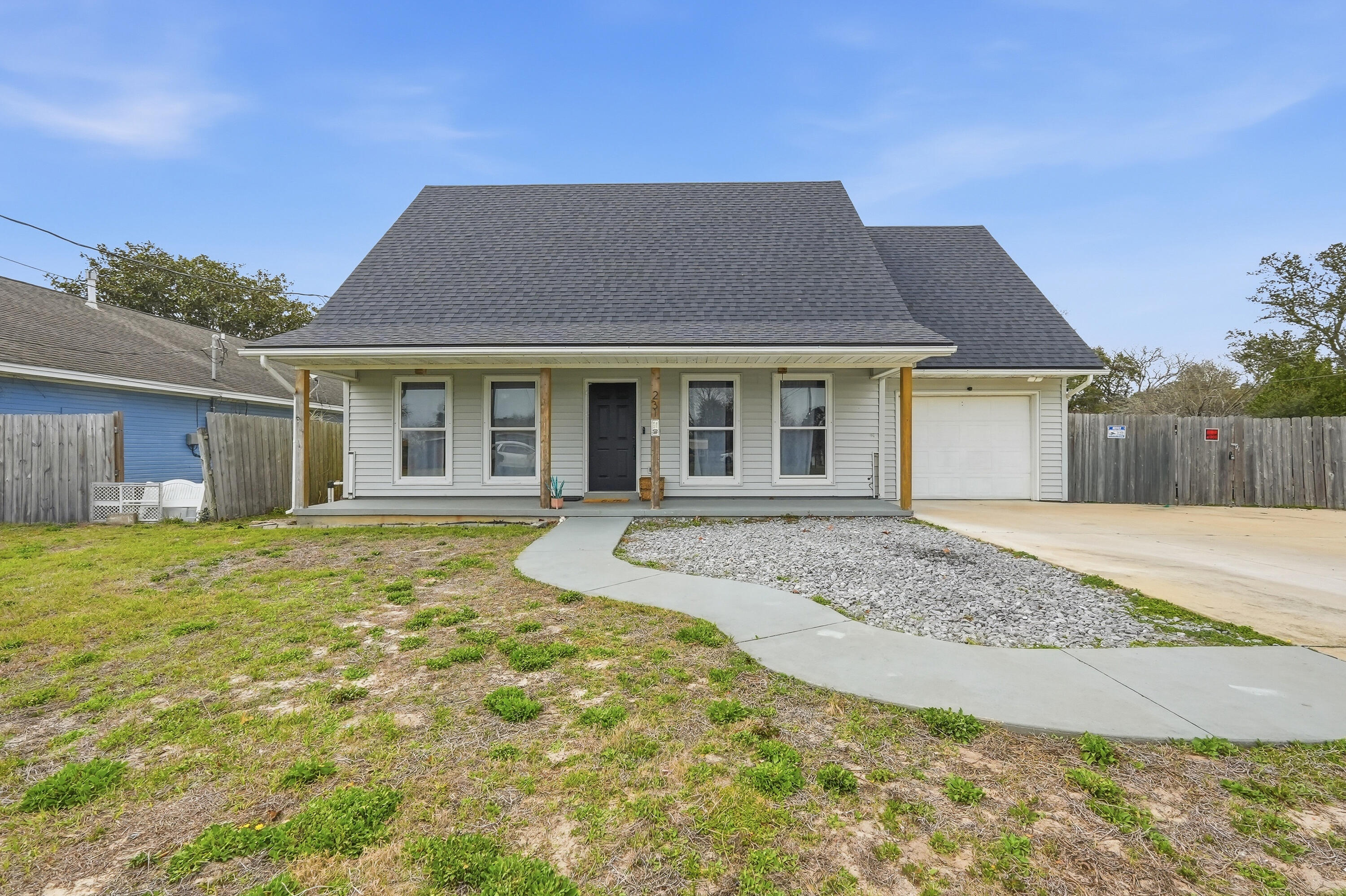 Comfort, convenience, and coastal proximity.

Move-in ready and ideally located just minutes from Hurlburt Field! This cozy 3-bedroom, 2-bath, two-story home sits on a spacious corner lot and features a convenient first-floor primary suite with two additional bedrooms upstairs. Recent updates include fresh interior paint, new upstairs carpet, and a brand-new kitchen countertop. The family room immediately welcomes you offering a nook with endless potential to create a Sunday reading corner, office area, or coffee bar. Flow right into the kitchen and dining area with a bay window view. The large yard offers plenty of room for outdoor gatherings, gardening, or even a future pool and the double gate on the fence allows ample room for boat parking, RV parking, and more! Conveniently located between Navarre's beautiful beaches and the shopping and dining of Fort Walton Beach, reach out to your favorite agent to schedule a showing today!