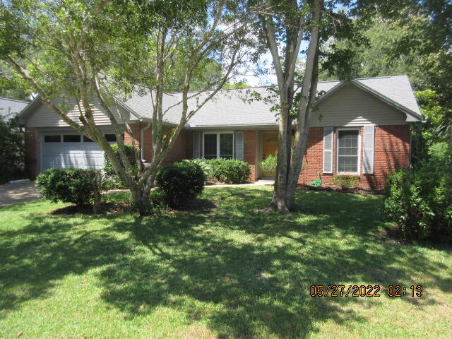 Bluewater Bay lovely brick home on a corner lot.  Easy maintenance home.  Split bedroom plan, stainless appliances.  Short walking distance to restaurants, banks, grocery stores and only 20 minutes to EAFB and 15 minutes to beaches.  Heated and cooled Florida room to enjoy the family gatherings! No carpets. All laminate and tile floors.  Wood deck for enjoying the summer BBQ.s gathering. No carpet.  SMALL DOG  NO CATS AND NO SMOKING!!!!  Call today for personal tour.  Available immediately!!