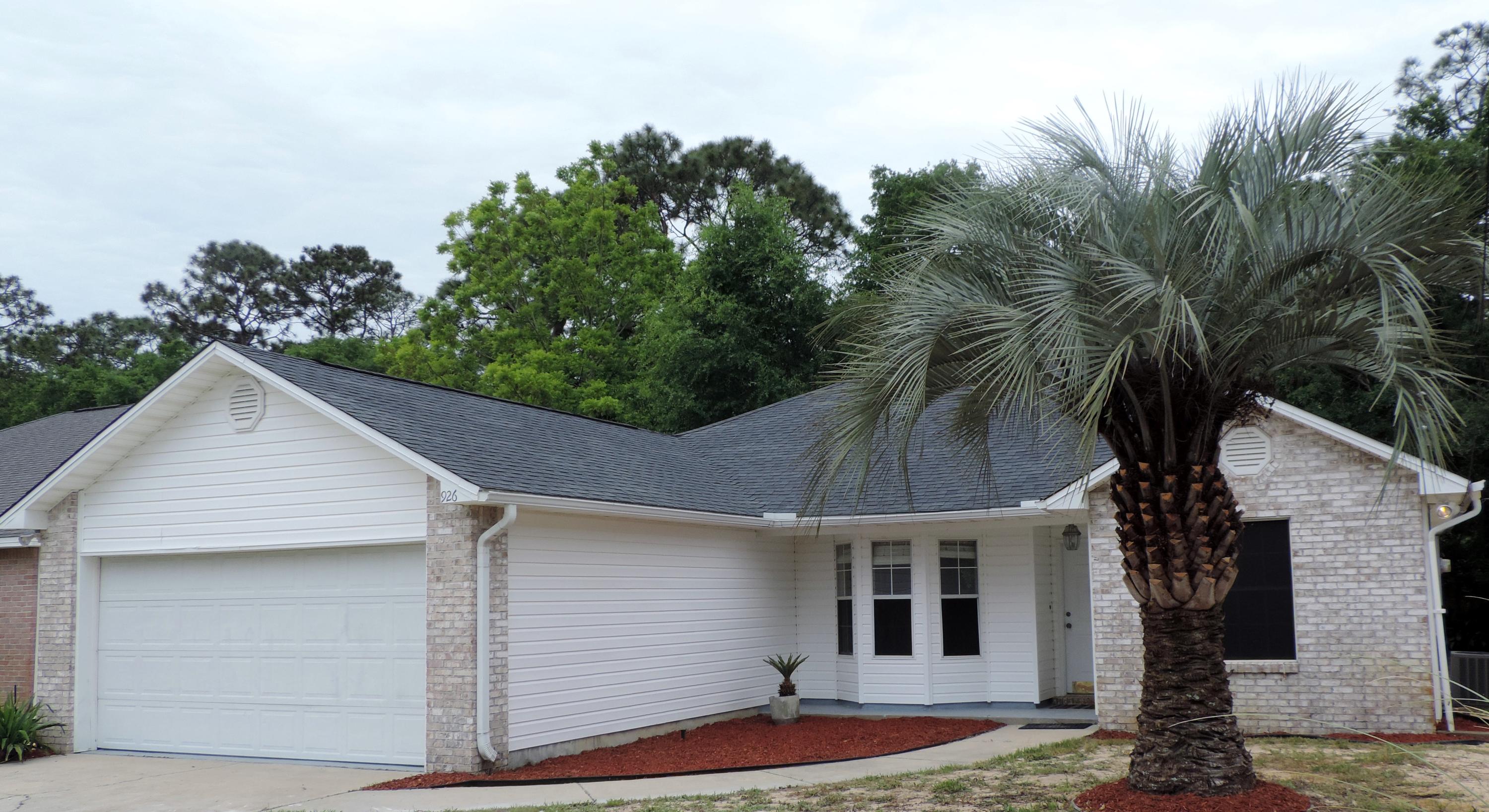 This lovely Mills Landing home is located minutes from the Hurlburt East Gate and Eglin. Perfectly situated just a short drive from shopping, restaurants, the mall. Only a ten minute drive to the beautiful Gulf beaches. Upon entering your new home you can't help but see the modern kitchen with Espresso finished cabinets and yes granite counter tops. a stainless steel vent hood above the cook top allows for a clear view of the great room. The great room is tiled with the same as dining room and kitchen and features a wood burning fireplace in the corner of this cathedral ceiling room. The master bedroom is spacious with a beautiful ceramic tile that has a wood look flowing into the master bathroom. The master bathroom has a granite topped vanity and features plenty of room to get ready. Two additional carpeted bedrooms are located on the other side of the home along with the main bathroom. A 4th bedroom is located separately off of the kitchen. An updated home like this in such a location is hard to find. Take a look, this is perfect for you and your family.
