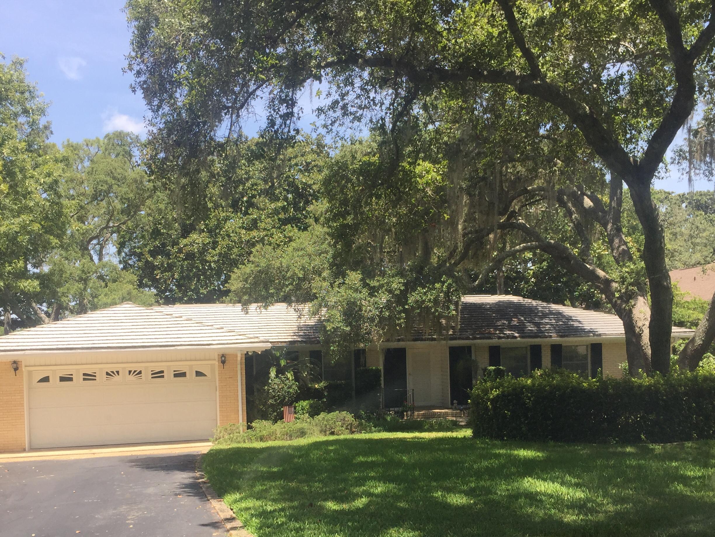 A MILLION DOLLAR VIEW WITHOUT THE MILLION DOLLAR PRICE TAG!This 3BR/2BA brick home is nestled on a 1.2 acre deep waterfront lot on the much desired Cinco Bayou. This home was defiantly built for entertaining with it's huge open patio/deck overlooking the beautiful Bayou.Both the front and back yards are beautifully landscaped boasting mature trees and manicured shrubbery with a well and Sprinkler System.Upon entering the house you will immediately notice how well maintained this house has been.The Family Room has wall to wall carpet & a Brick gas fireplace.The kitchen has tile floors & a Sub Zero refrigerator.The MBR has a sliding glass doors to the patio with a private view of the tranquil backyard & water.House has a whole house generator..Call Julia today to view this beautiful property