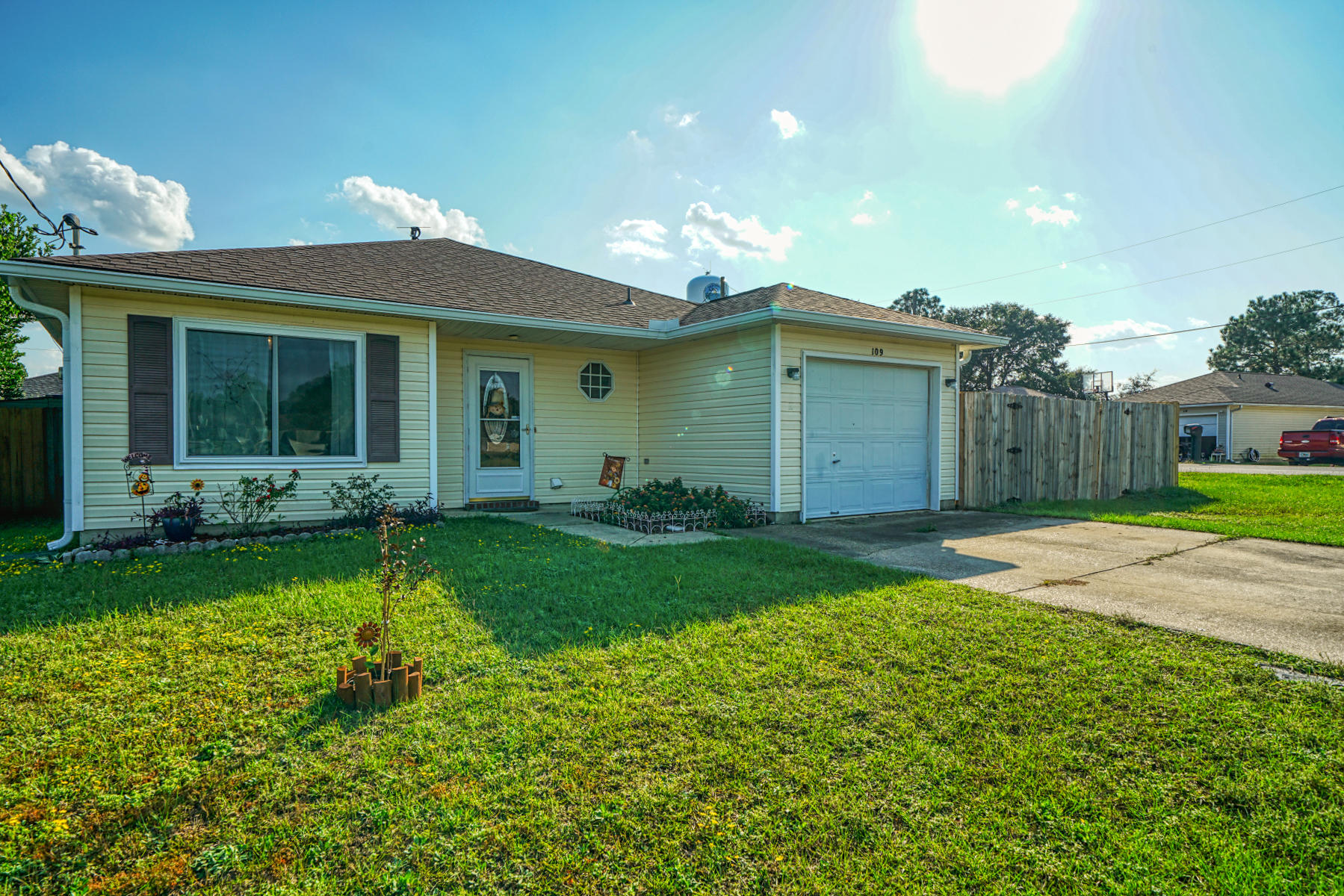 Motivated Sellers! Come and have a look at your next home. This 3/2 is nestled in a quiet neighborhood with quick access to PJ Adams and Hwy 85.  You'll enjoy the comfortable split floor plan and eat-in kitchen.  Being a corner lot you'll have a lot of extra fenced in space to either park a camper or enjoy more entertaining space.  New roof completed in 2019, new AC unit installed in 2018, new windows installed in 2020 with transferable warranty, annual termite inspection conducted June 2020.  ADT Security System installed and ready for use. This home has so much to offer!