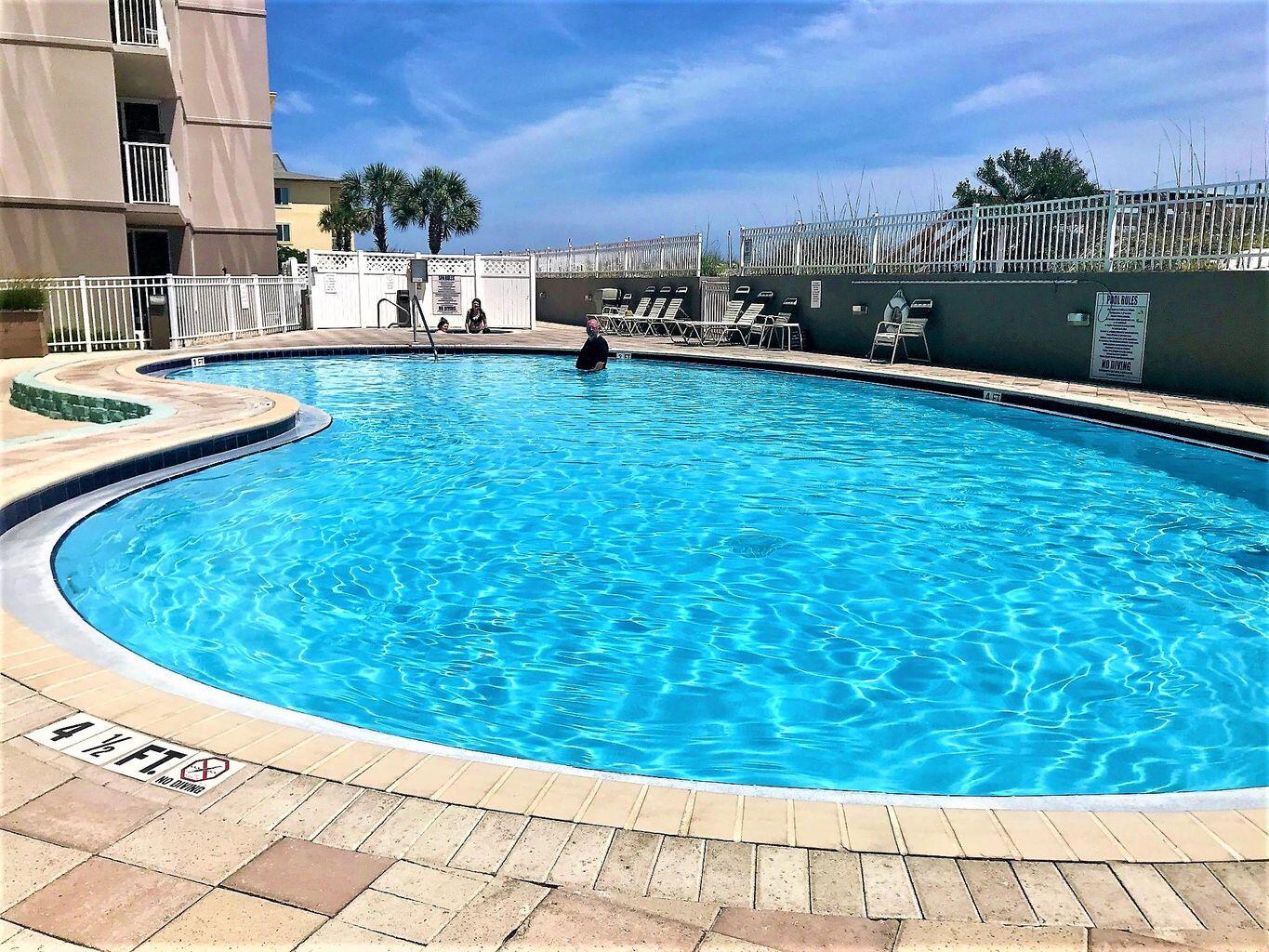 This lovely condo is your ticket to the fabulous beach life style. Fantastic view of the coastline from the balcony. Open floor plan and updated flooring make this condo stand out.  View of the water from the master bedroom. Make vacation memories and you can cash in $$$$ on rentals.  Pool, fishing, and exercise room are just some of the popular amenities. Lots of fun restaurants and attractions in the area. Buyer to verify information.