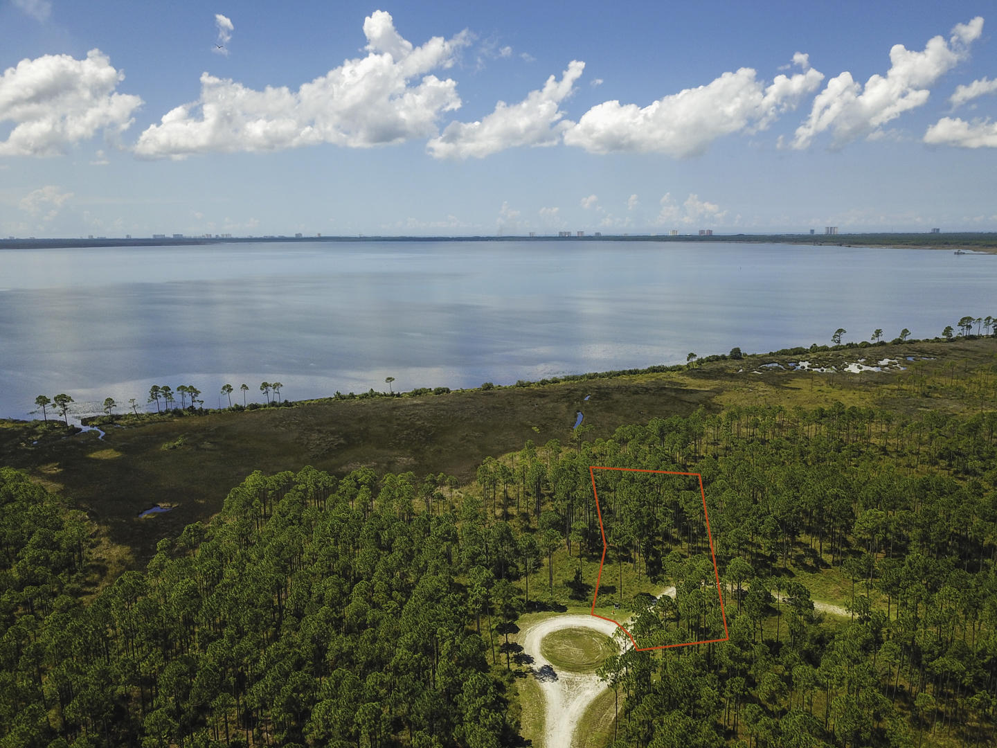 Entered for comp purposes only. This is the perfect opportunity to build your dream home! Rivercamps is a quaint neighborhood nestled between the Intracoastal Waterway, Crooked Creek and West Bay. This gated community has so much to offer. Linked by extensive trails and boardwalks, the RiverCamps community offers outstanding amenities such as the RiverHouse swimming pool, grill and pavilion, fitness center and a boat ramp on the Intracoastal that leads to the Gulf of Mexico.