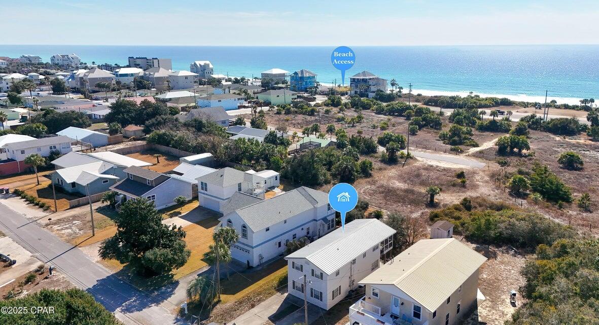 COASTAL INVESTMENT OPPORTUNITY!! Steps from the Gulf!! Welcome to 22123 Bataan Ave, a rare find just steps to the Gulf! Offering second-story water views & located on a quiet dead-end street, this home presents endless possibilities! This is 100% investment property/ fixer upper! Currently listed as a single-family home, it's designed as a duplex, (and grandfathered in as a duplex as long as you don't change the footprint of the home!) making it ideal for rental income or multi-generational living! Whether you choose to convert it into a true single-family home or complete the duplex setup, this property provides incredible flexibility and investment potential! With the Gulf views, a rare coastal opportunity you won't want to miss!