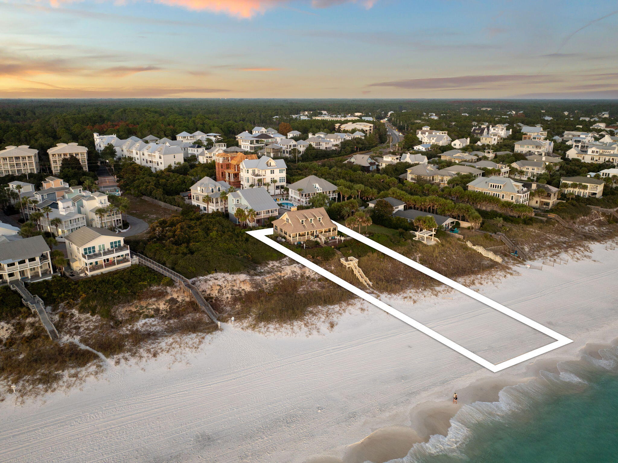This remarkable gulf front features an exceptionally positioned Gulf-front home, already thoughtfully subdivided prominently located in the heart of Seagrove Beach within the gated enclave of Sea Turtle Lane. Impressively yielding a combined 100 feet of pristine, privately owned beachfront, the possibilities are as vast as the panoramic coastal views. This coveted homesite offers an existing southern style home with exceptional outdoor porch space and endless water vistas or the opportunity for redevelopment with two contiguous lots or one singular oversized building envelope. This property offers the flexibility to realize your vision with direct access to the sugar-white sands and the shimmering turquoise waters of the Gulf of Mexico. This unique lot ensures unparalleled privacy and tranquility within a rental-friendly neighborhood, providing an unparalleled opportunity.

Strategically positioned near the world-renowned charm of Seaside, FL, known for its innovative New Urbanism design, this enclave offers an unmatched blend of serene coastal living and vibrant local culture. This is more than a purchase; it's an investment in an exclusive lifestyle where the beauty of the Gulf Coast becomes your daily backdrop.

Seize this rare chance to create your dream home(s) in one of the most desirable locations along 30A.