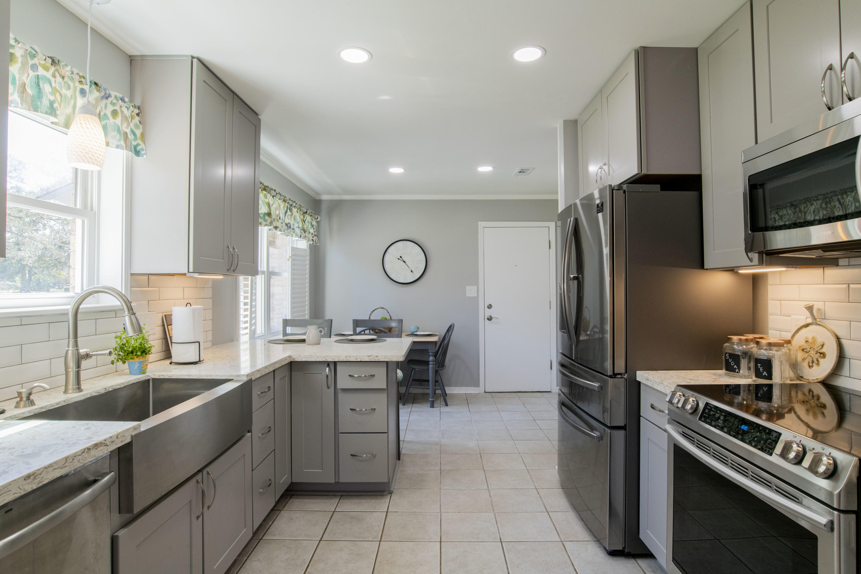 Nestled in the wonderful neighborhood of Bay Cliff Estates, this renovated 3 bedroom 2 bathroom home has so much to offer! Upon arrival, you'll notice the gorgeous pavers in the driveway and that it's located directly next to the neighborhood park. The kitchen has been newly remodeled with brand new soft close cabinetry, Quartz counter tops, back splash, Energy Star Qualified stainless steel appliances, recessed lighting and farmhouse sink. It also comes fully equipped with a pantry, formal dining room , breakfast bar and breakfast nook. Just off the formal dining room is the spacious living room with vaulted ceilings with wood beams for added charm and a wood burning fireplace. You'll also enjoy the large screened enclosed patio which ope Nestled in the wonderful neighborhood of Bay Cliff Estates, this renovated 3 bedroom 2 bathroom home has so much to offer! Upon arrival, you'll notice the gorgeous pavers in the driveway and that it's located directly next to the neighborhood park. The kitchen has been newly remodeled with brand new soft close cabinetry, Quartz countertops, back splash, Energy Star Qualified stainless steel appliances, recessed lighting and farmhouse sink. It also comes fully equipped with a pantry, formal dining room , breakfast bar and breakfast nook. Just off the formal dining room is the spacious living room with vaulted ceilings with wood beams for added charm and a wood burning fireplace. You'll also enjoy the large screened enclosed patio which opens up to a sizable deck (trex decking) with a brand new hot tub. This is the perfect space for entertaining guests! The master bedroom has a brand new granite double vanity, new mirrors and fixtures, shower/tub combo and 3 closets. The two additional bedrooms share a hall bath that also has a brand new double vanity with new mirrors and fixtures, also with a shower/tub combo. Other notables are Pella windows, NEW ROOF with new gutters and chimney siding, workshop in garage with 130 additional square feet of climate controlled space which would make for a great office, gym or art studio. New ceiling fan and door on patio with plexiglass coverings for patio making for a wonderful greenhouse in the cold winter months. There are also blinds throughout, freshly painted, sprinkler system, newly landscaped, gorgeous paver driveway, fully fenced back yard with privacy fence and additional gate opening directly to the park just next door. Enjoy all the conveniences of living on Scenic Hwy. Just 3.5 miles to the airport and 12 miles to beautiful Pensacola Beach! Check out the full video tour on YouTube or the MLS!