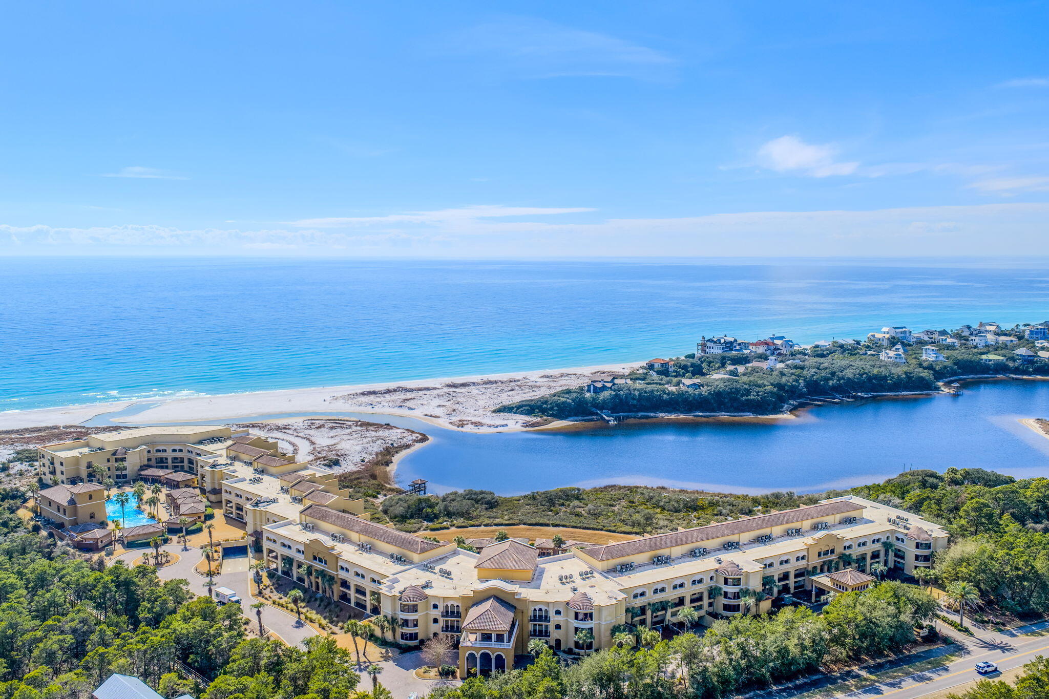 This residence is the epitome of the coastal  luxury lifestyle. The spectacular panoramic view of the sand and waves  is both inspiring and unique.  In addition there are the relaxing views of  Big Redfish coastal dune lake which connects into the Gulf. The interior has been professionally designed by a renowned local designer and the ambiance is refined, serene, and effortlessly reflects it's stunning environment. This home is the Feb/Mar cover feature in a prominent local lifestyle magazine.  Hand made custom window treatments frame the floor length windows. The gorgeous  kitchen is open , inviting, and has a walk in pantry. Professional grade appliances, pot filler faucet, beautiful hood above the stove, custom cabinets, glass mosaic backsplash, and is fully stocked  with top quality brand new  glassware,  tableware, stainless cutlery , and even China. The primary bedroom has a sitting area, fire place, walk in closet, and access to the balcony. The spa like bathroom features a fabulous garden tub that is the magazine cover shot and the walk in shower has a steam feature. 
 Every room is a work of art that flows together. There are 2 sets of full size  Speed Queen washers and dryers. Brand new linens and towels included , this property is completely move in ready. Sanctuary by the Sea is like living in a Mediterranean Villa. 3 impressive pools,2 hots tubs, club house, virtual golf, theater room,  fitness center, gas grills, seasonal gas firepits,  and access to the beach and lake. The grounds are impeccably cleaned and maintained. Sanctuary by the Sea was recently waterproofed, painted, and the windows were replaced with high rated storm windows. Storage for paddle boards, kayaks, and bikes. Cage storage #73 is also included. Gated and guards that patrol the property. See the document section for all the features of this amazing property.