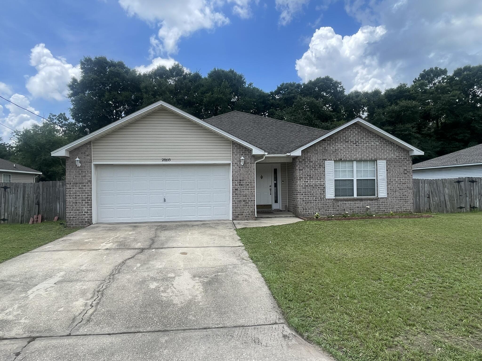 Adorable 3 bedroom 2 bath home with 2 car garage and privacy fenced back yard. Conveniently located to shopping, schools, and entertainment in Crestview.  This home feels larger than its actual square footage.