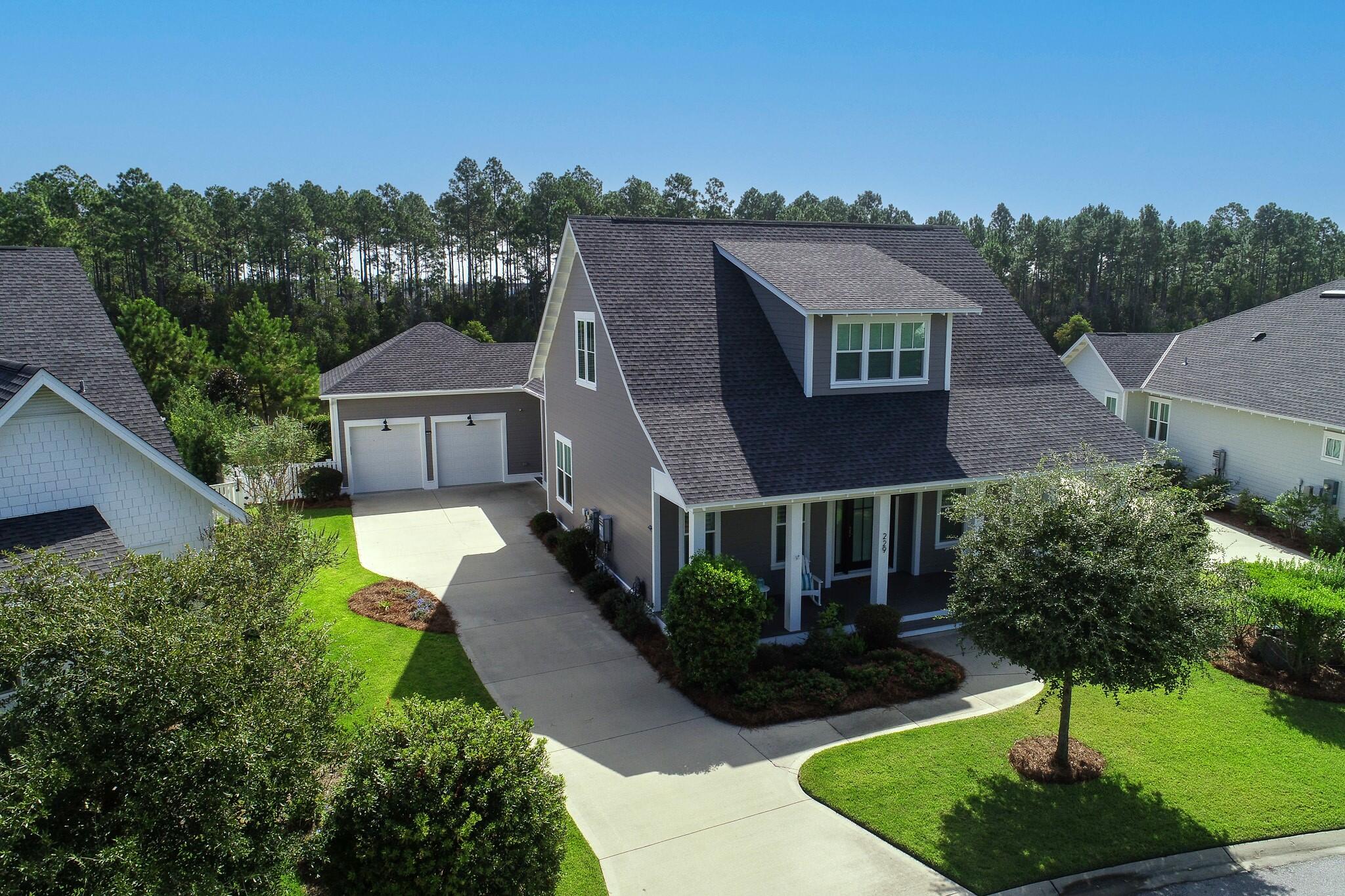 Welcome to this stunning home in the highly sought-after Watersound Origins community.  Boasting 4 bedrooms and 3 bathrooms, this residence offers a perfect blend of modern elegance and coastal charm.  Step inside and be greeted by an open concept kitchen and living area, ideal for entertaining guests or spending quality times with loved ones.  The spacious master bedroom and bathroom ensuite on the main level provide a serene retreat, while a convenient guest bedroom on the same level offers comfort and privacy.  The interior features are truly exceptional, with the warmth of 10' ceilings, the timeless charm of shiplap accents, custom kitchen cabinets with decorative lighting, exquisite hardwood floors and separate dining area that adds a touch of sophistication to every meal. The upstairs offers two additional guest bedrooms, full bathroom and bonus media area overlooking the lovely courtyard.  The carefully designed layout ensures seamless flow throughout the home, creating an inviting and functional space for everyday living.  As you explore the exterior, you'll discover an array of appealing features.  Situated on a premium lot, this freshly painted residence offers privacy and tranquility.  The two-car garage provides ample storage space and convenience.  The inviting pool is perfect for hot summer days, while the screened porch allows for relaxing evenings enjoying the gentle coastal breeze and peaceful lake views.  Nestled in the most desirable location on a quiet road, this home offers the best of both worlds - a peaceful retreat away from the hustle and bustle, yet still close proximity to all the amenities the area has to offer.  The front porch overlooks a charming courtyard, providing a picturesque setting to unwind and enjoy the natural beauty that surrounds you.  And don't forget the breathtaking sunset views that will leave you in awe.

As one of South Waltons most coveted communities, Watersound Origins combines an active lifestyle surrounded with natural beauty and amenities with the convenience of shopping and dining at the brand new Watersound Town Center.  The abundance of amenities includes tennis and pickleball courts, a resort style pool, fitness center, walking trails, basketball court, unlimited golf, dock access to Lake Powell, expansive green space for additional outdoor activities and just minutes from the beautiful turquoise waters and sugar white sand beaches of the Emerald Coast.  The Watersound Town Center brings access to the new Publix Super Market, delicious restaurants, weekly Farmers Market, healthcare facilities and other future shopping and dining experiences to Watersound Origins!