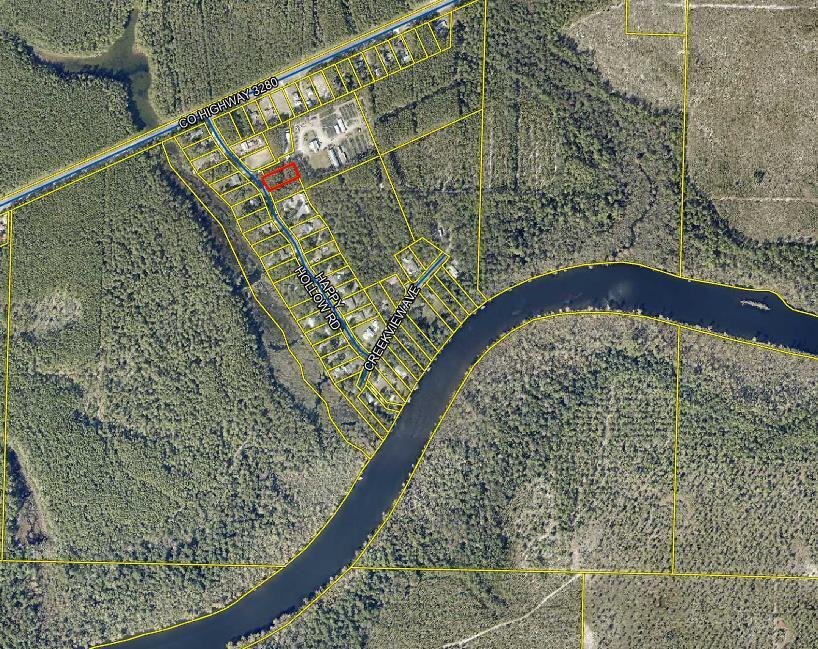 NEW PRICE and ALL BOXES ARE CHECKED!     #1.  Half-Acre Lot,    #2.  Wooded Lot,    #3.  Paved Road,     #4.  NO HOA,     #5.  NO FEES,    #6.  Restrictive Covenants to help protect your home values & property,    #7.  Water access to Black Creek,     #8.  South of Hwy 20 and Central Location to Hwy 98, Hwy 20, Hwy 331, and Hwy 81,    #9.  City Water Available,     #10.  Priced under $90,000 for a Half-Acre Lot!!      Top-Ten Reasons to take a look at Happy Hollow Subdivision and make it your New Home!!