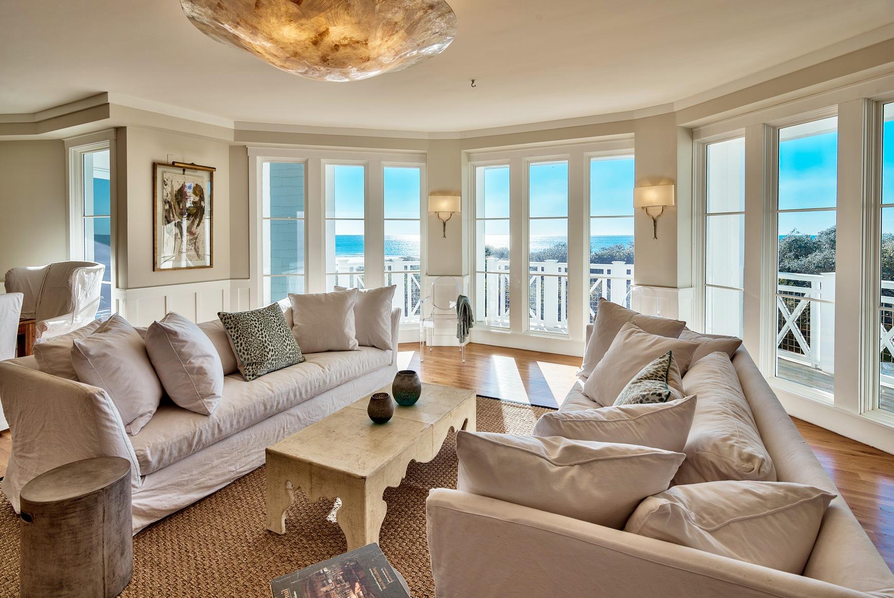This residence is nothing short of spectacular and is the BEST PRICED Crossings condo above the first floor. From the moment you walk through the door the ocean views will take your breath away. Its location in the ''C'' building closest to the gulf means you see only natural foliage and the postcard worthy beach from all angles of the expansive, open floorpan. Featuring magazine worthy decor, the unit truly feels more like a stand alone home than a condominium. This single-level, second-floor location is the best of both worlds. You get phenomenal views, but with minimal stairs! The residence has beautiful hardwood and travertine tile floors throughout, and an open gourmet kitchen with stainless appliances and a Viking range. The expansive porch takes full advantage of its corner locati giving you complete privacy from the neighbors. If minimal upkeep away from the crowds is what you are looking for, the east side of Watersound Crossings has the absolute best beach for those seeking quiet and solitude. This unit comes with a separate one-car garage with ample storage space. SUP down the canal to Camp Creek Lake or bike around the corner to hear live music at the Hub; Seaside and Rosemary are also all easy cycling distance away from this central 30A location.  With 2016 gross rental projections of over $100,000, this one has it all!
