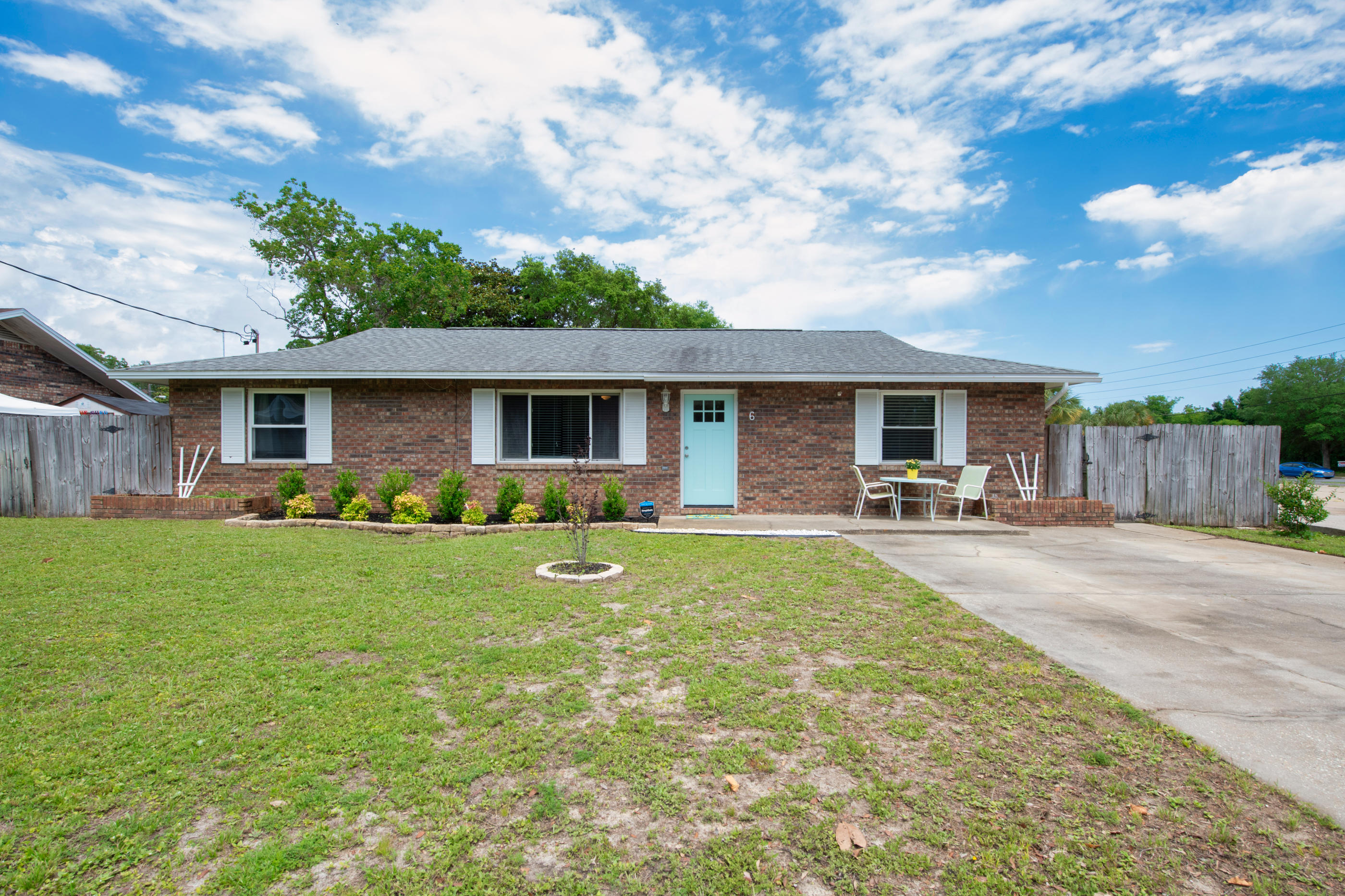 This renovated move in ready home is ready for new owners. Conveniently located 2.5 miles from Hurlburt Field. As you enter the front door, you are welcomed into a bright spacious family room with laminate flooring which flows into the dining area. The kitchen features new stainless steel appliances and a beautiful back splash with a breakfast nook/coffee bar area. The large backyard is fenced in with a new open deck and a fire pit for outdoor entertainment and a shed for extra storage. The bathtubs have just been refinished and new insulation has been put in the attic for improved energy efficiency. The washer and dryer convey AS-IS This home is protected with an American Home Shield home warranty which is transferable to the new owners for buyers peace of mind.