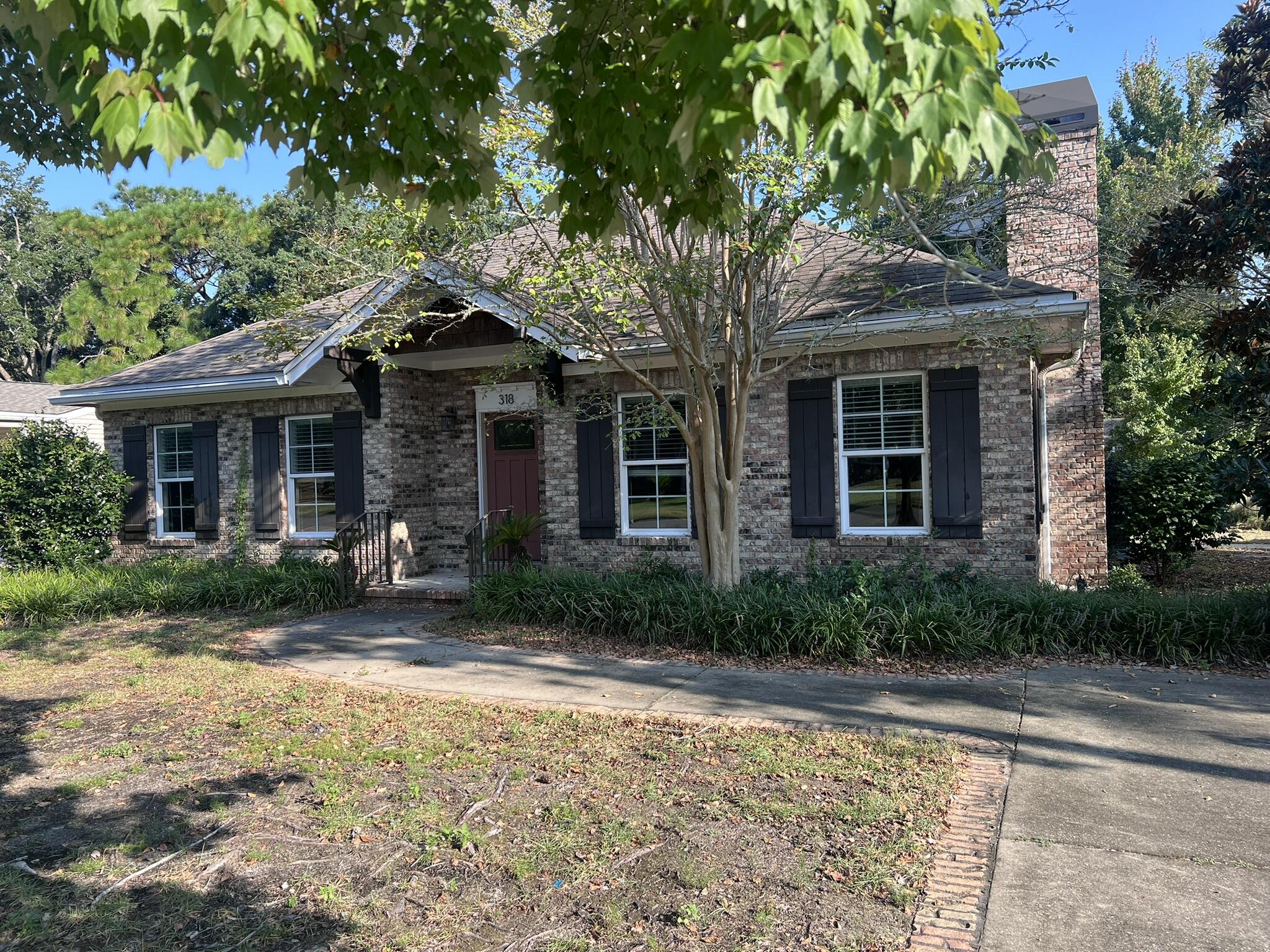 Seller will assist with closing costs on this pristine, custom, quality-built home in Valparaiso.  Each bedroom features an en-suite bath and a walk-in closet, providing the perfect blend of privacy and convenience. The kitchen is a culinary dream, with stainless steel appliances, custom cabinetry, and ample counter space, ideal for entertaining.  The open-concept design flows effortlessly into the living and dining areas. A dedicated office or library space provides the perfect retreat for work, study, or quiet reading. For added convenience, the home includes a spacious laundry room with ample storage, making organization effortless. The exterior has a detached garage, screen porch, and paver patio. No HOA Fees. Easy show and fast closing!