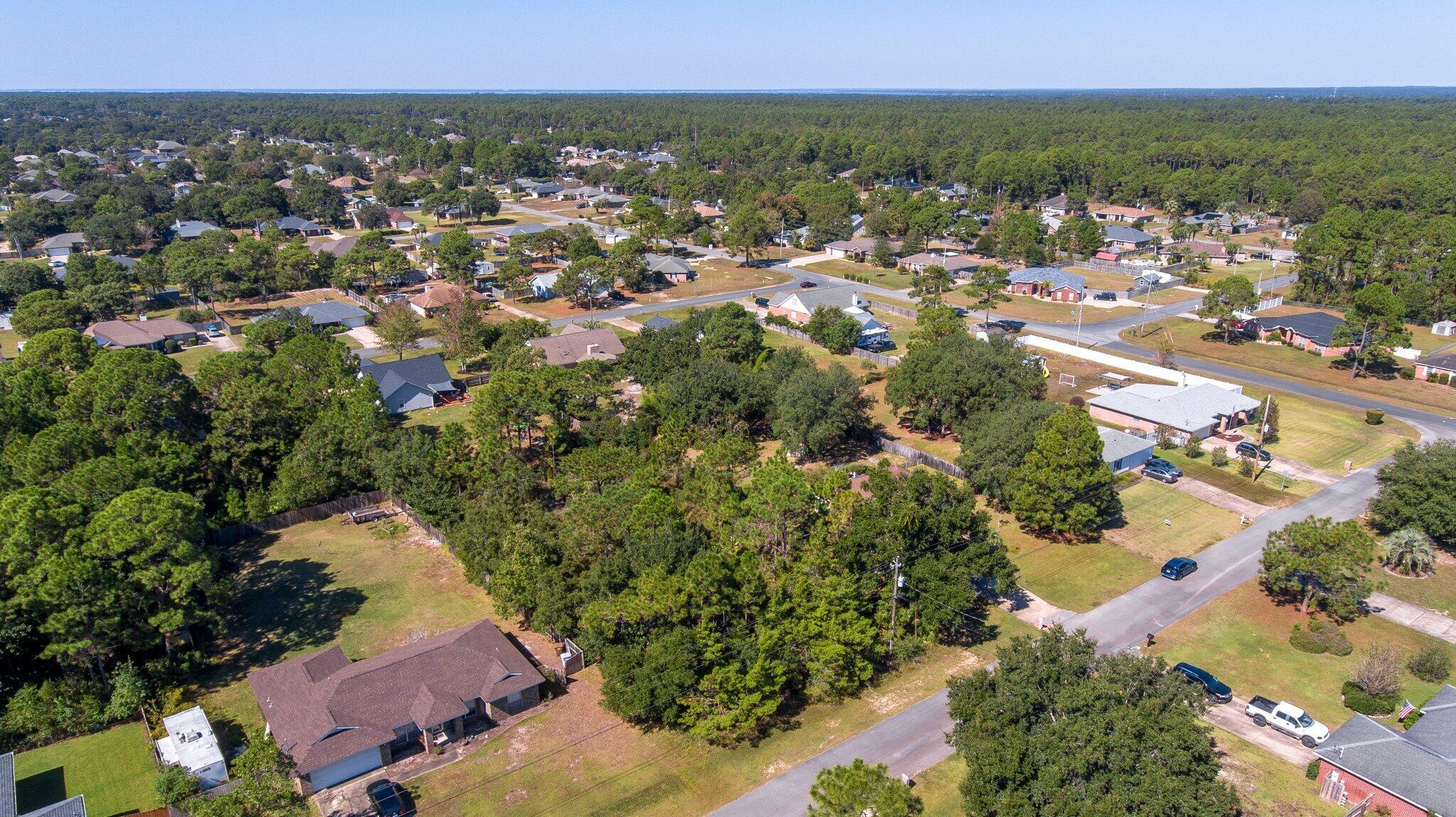 Vacant lot located in the desirable neighborhood of Holley By The Sea.  Build your dream home and enjoy all the community amenities that are offered with residency in one of the largest residential communities in Navarre.  Located within a great school district and minutes away from the beautiful beaches of the Emerald Coast, shopping, and restaurants.