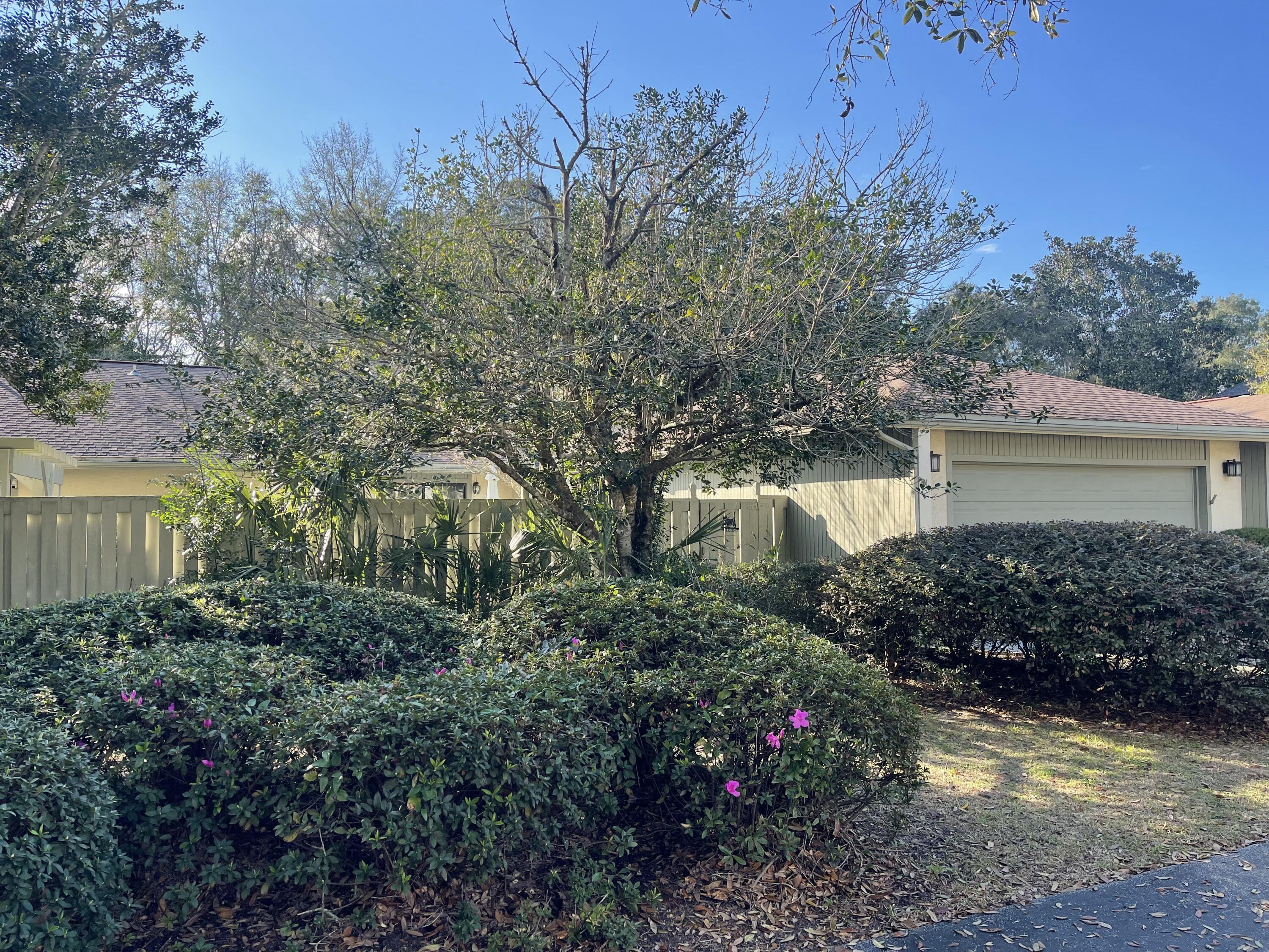 Private Lot, Excellent condition, Ready for new owner to enjoy!!!
Oversized bedrooms with private courtyard patios for both.
Cathedral ceilings in living room with adjoining dining room and large screen porch.
Kitchen overlooks the family room with additional  space for breakfast area., that also overlooks private coutyard for entertaining.
Both bedrooms have large walk-in closets and master has updated shower.
Two car garage  with easy access to kitichen and wide enough driveway for additional parking.
Home is surrounded by beautiful trees and is in a cul-de-sac street for privacy.
Terrific neighborhood  close to pool, tennis, golf and marina for social activities.