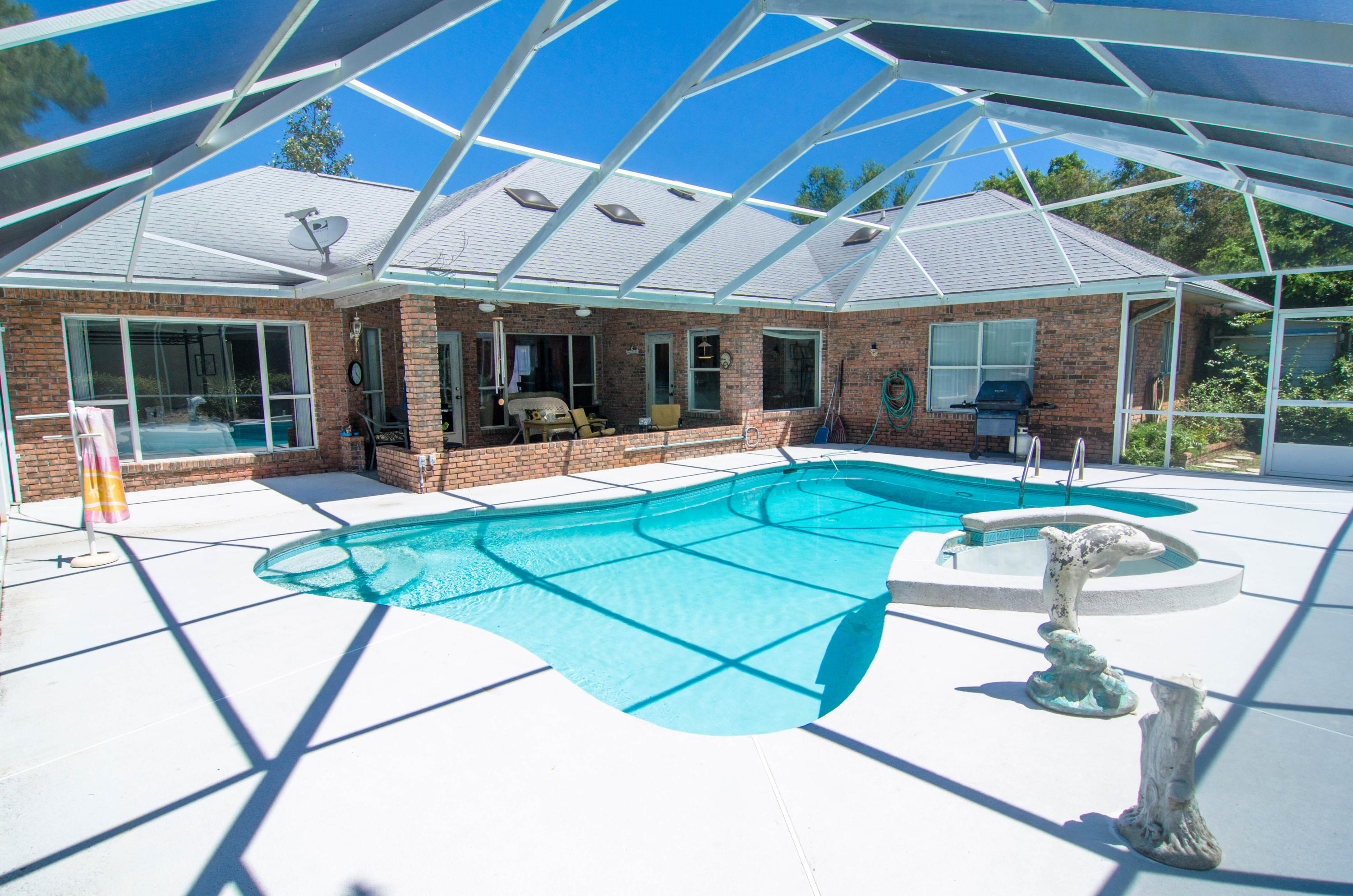 Country club living at the beach in Indian Bayou. Don't miss your chance to buy the LOWEST PRICED home in desirable Indian Bayouwell maintained home on a large lot offers 3 bedrooms, 2.5 baths home plus a sparkling screened pool and lovely covered porch area and views of the Indian Bayou golf course. This home is built to take advantage of the pool and rear yard with loads of natural light and pool views from almost every room! New roof in 2010 and all new floors including sleek tile and wood laminate. The large driveway and side load garage allows parking for multiple cars. All of this wrapped up in one of the area's most desirable neighborhoods, Indian Bayou, with ultra low HOA fees that include security! Just a quick jaunt to the beach via Henderson Beach - owners in the city o Destin can get a greatly reduced season pass to park all season long at Henderson - easy to park and less crowds! Do not miss this home - it will not last long at this price! *All information deemed important to buyer to be verified**