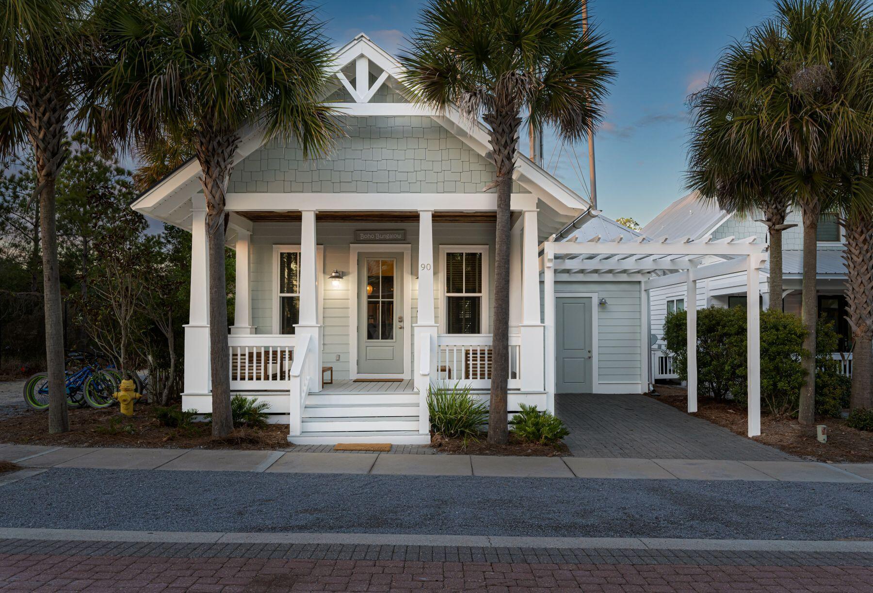 This Seacrest Beach home, dubbed ''Boho Bungalow,'' is the perfect combination of charm and character, situated at the end of a quiet dead-end street with a direct path to Scenic Highway 30A. Featuring three beds, two baths and just over 1,700 square feet of living space on one floor, this home has been recently renovated, redecorated and refurnished by a professional interior designer. The home's open floor plan includes a cozy and spacious living room with vaulted ceilings; living area ceiling beam; reclaimed, painted wood ceiling; and, accent walls. Step through the living room into the kitchen with custom cabinets, marble countertops, a five-burner gas range and double oven and stainless steel appliances. A beverage station with shelves and wine fridge was added. Distressed hardwood floors and custom woodwork are apparent throughout the home and board and batten has been added to the living area, owner's suite and bath. The owner's suite hosts a king bed with vaulted ceiling, private en suite bath and master closet with new custom shelving. The second and third bedrooms share a bath and feature a queen bed and a full-over-full bunk bed with trundle, respectively. Other notable updates include new furniture and decor, new HVAC; laundry room storage; and, fresh exterior and interior paint. Sit under the pecky cypress porch ceilings and relax after a day in the sun. This home is sold furnished and features a locking owner's closet for storage and privacy. Grab a bike or take a walk to nearby Rosemary and Alys Beaches, enjoy seasonal tram service to the beach and back or take a short stroll to the 12,000-sq.-ft. community pool and amphitheater. Seacrest Beach is home to numerous boutiques and dining options and more than a mile of shaded walking trails.