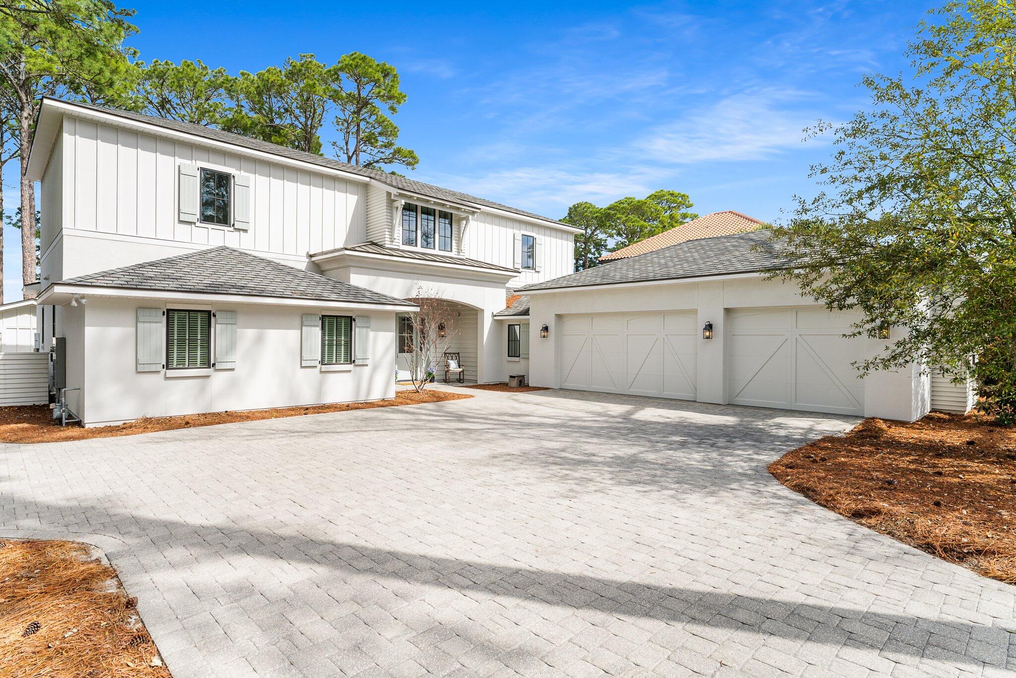 Welcome to this extraordinary builder's personal residence perfectly positioned on a natural setting with sweeping unobstructed and panoramic views of the beautiful Bay. This one-of-a-kind property offers luxury, comfort and the ultimate coastal lifestyle complete with a spacious 6 bedroom main house and separate detached guest house ideal for hosting family and friends. Step outside to your own private paradise where a saltwater pool invites you to unwind while soaking in the tranquil surroundings. Boating enthusiasts will appreciate the private dock, boathouse with lift and three jet ski lifts making it effortless to explore the Bay's pristine waters. The 3-car oversized garage offers ample space for vehicle storage and recreational gear. Designed with elegance and functionality in mind the first floor boasts open concept living, dining and kitchen areas with hardwood floors, 10-foot ceilings, cove crown molding and spectacular water views. Chef's kitchen features Sub-Zero & Wolf stainless appliances, custom cabinetry, large walk-in pantry, granite counters, glass backsplashes and ship lap accents. Included in main area is master suite retreat with classic finishes and serene water views, guest bedroom with bath, office, and roomy bonus/flex room ideal for multi use.  Second floor incorporates den/sitting area, 4 bedrooms and 2 baths. Cozy detached guest house includes mini kitchen, full bath and peaceful water views. No HOA. Conveniently located on Bayshore Drive near lighted intersection and close proximity to beach accesses, shopping, dining and all the Emerald Coast has to offer!