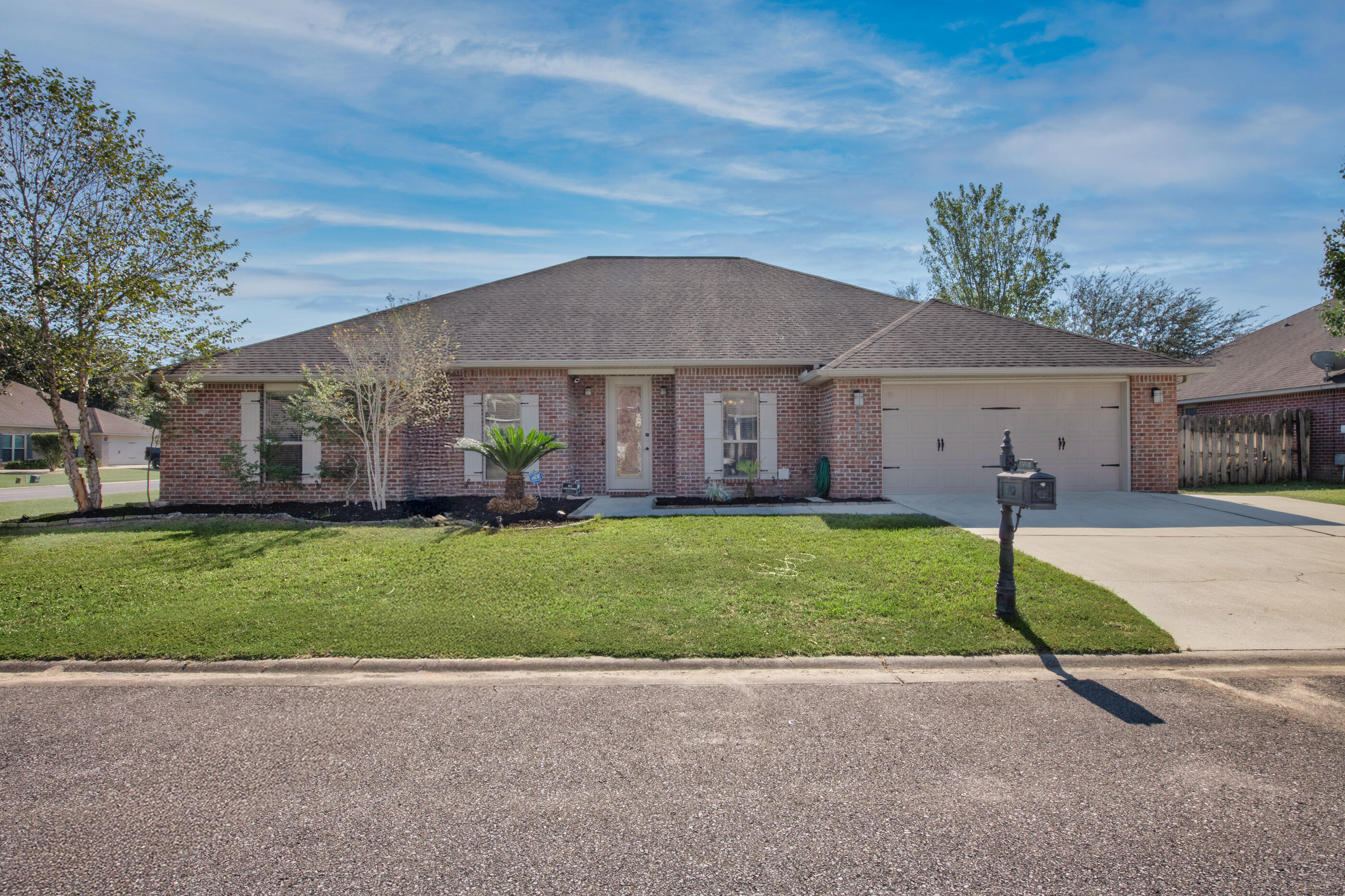 OFFERING $10,000 in buyer closing costs!! Assumable VA loan available for qualified buyers. Stunning 5BD/3BA all-brick home in Kaitlyn's Preserve with bamboo floors, open-concept living, and formal dining. Chef's kitchen with granite counters, custom cabinets, large island, and breakfast bar. Split floor plan with private primary suite featuring dual walk-in closets, granite double vanity, soaking tub, and separate shower. Upstairs bonus room perfect for game or guest space. Relax on screened or new paver patio within fenced yard. Prime location--10 min to 7th SFG(A)/Duke AFB, 20 min to Eglin AFB, 35 min to Hurlburt. Schedule your private tour today!