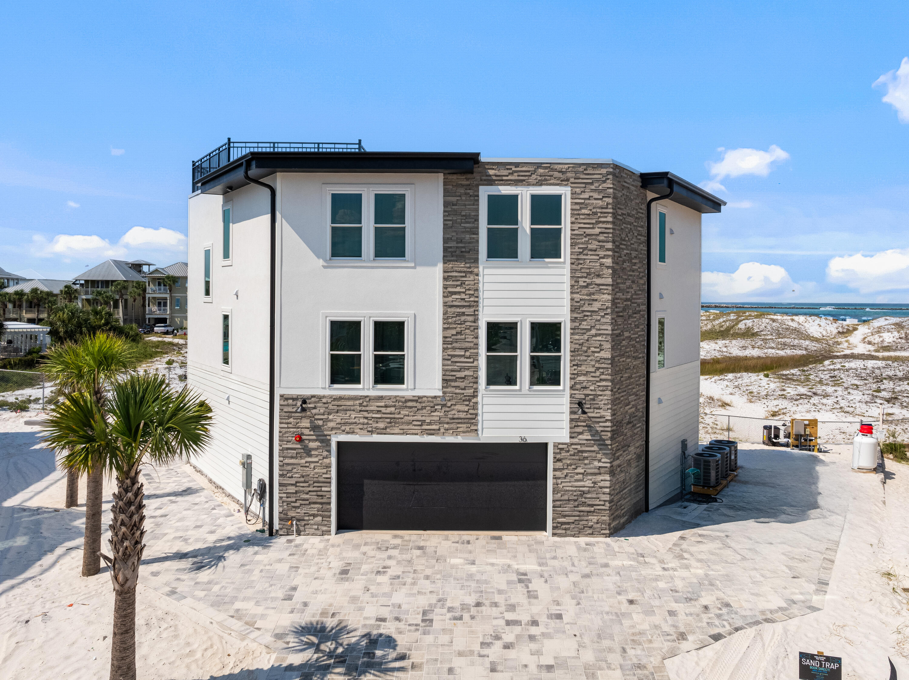 Was temporarily off the market to complete construction. Now completed and ready to view! 

Spectacular New Construction with Unrivaled Views! 

This fully furnished, rental-ready masterpiece offers 6 bedrooms, 6 full baths, and 2 half baths across 3,000+ square feet of impeccably designed living space. Perched on Holiday Isle, the home boasts panoramic, unobstructed views of the Destin Pass and Gulf that are truly second to none. 

Every detail has been crafted for comfort and style — from designer furnishings to premium finishes — creating the perfect blend of coastal elegance and modern luxury. Whether you're looking for a private retreat or a high-performing vacation rental, this home delivers. Added Bonus: Enjoy your own private rooftop retreat, complete with lounge chairs  perfect for soaking up the sun or unwinding with unforgettable views