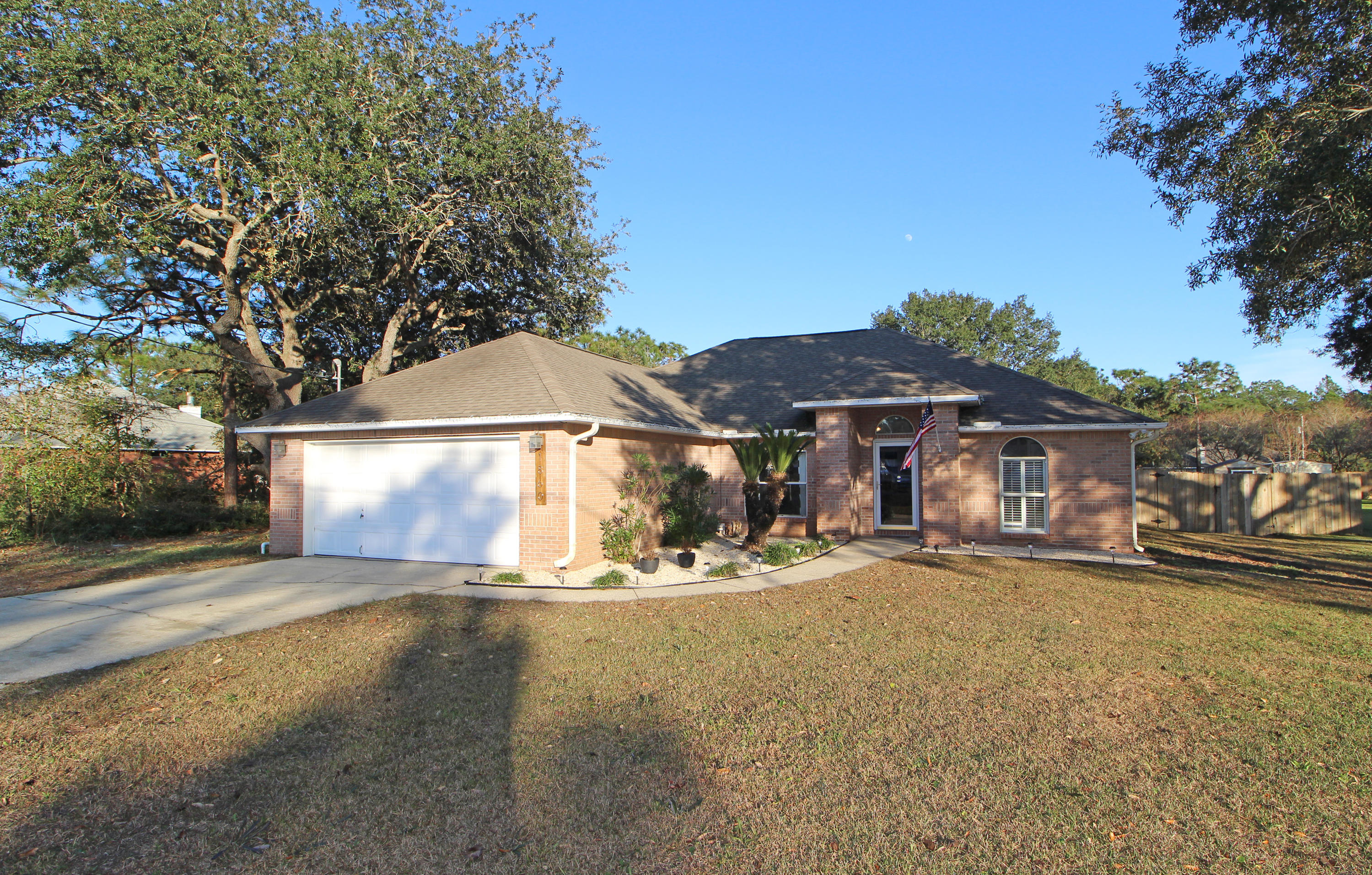 FANTASTIC CUSTOM BUILT HOME SITUATED ON A LARGE LOT IN DESIRABLE HOLLEY BY THE SEA! Open to a spacious living area with cathedral ceilings, designer paint color, corner fireplace with custom mantle, recessed accent lights and new laminate flooring throughout. Dining area has new light fixture and a large picture window with arched accent. Light and bright kitchen with lots of counter space, pantry, breakfast bar and tile flooring. Breakfast nook that overlooks the backyard. Master bedroom with trey ceiling. Master bath with raised new granite counter, double vanities, separate shower, garden tub and a large walk-in closet. Split bedroom floor plan allows privacy from kids or guests. Two additional bedrooms and a hall bath complete this perfect picture. Backyard is fully fenced and an open patio is great for cookouts.  Nice quiet neighborhood and Holley by the Sea has all the amenities to include a multi-million dollar recreation complex with swimming pools, lighted clay tennis courts, state of the art work out equipment, locker rooms, steam room, and sauna, covered picnic pavilions, playground and Club House with views of the Intracoastal Waterway. Just minutes to shopping and the most beautiful beaches.  Call today for your own private viewing.