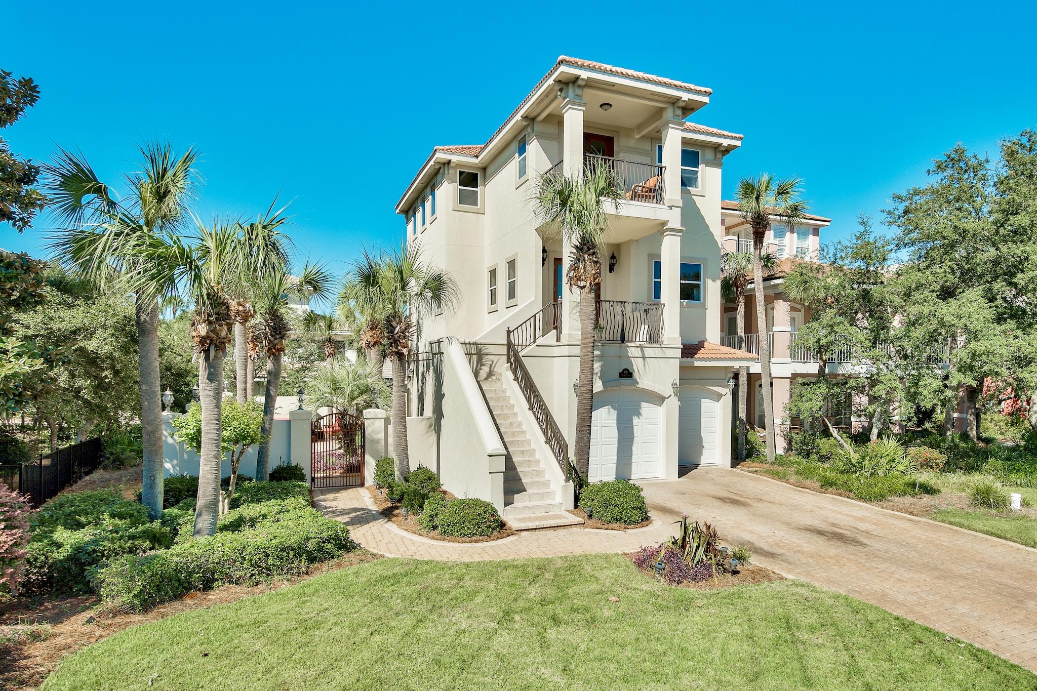 Impressive Furnished Mediterranean villa located in the gated community of Destiny West; this well appointed home features the best of both worlds gulf & lake views as well as an oversized lot with a courtyard entryway & ample room for a private pool. This gorgeous home features notable upgrades including beautiful hardwood flooring throughout the second floor living areas, masterfully designed eat-in kitchen with custom cabinetry, granite countertops, gas range and a spacious center island; optimal for entertaining. The living room is open to the kitchen area and flows onto a newly screened-in porch, perfectly positioned to face the Western sky to maximize views of Florida's famous sunsets.
