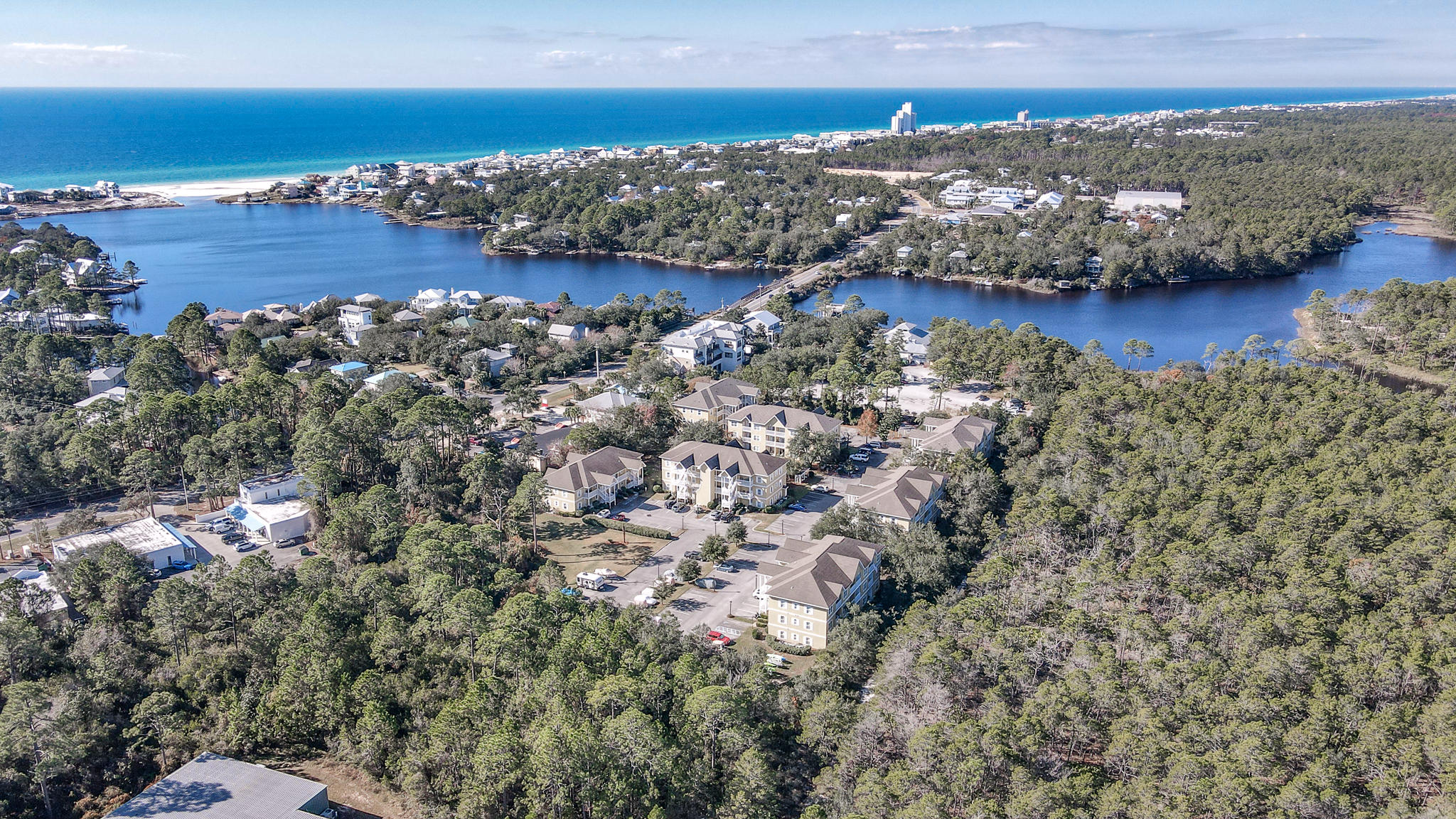 This 3rd floor end unit is private with a spacious covered porch overlooking the pool. This unit also has a separate laundry room inside. Only a 4 minute walk to the beach access just across 30A, quick access to Publix, bike rentals, shopping and dining. Seaside is just to the West minutes by bike or car. Beachwood Villas has lush tropical landscaping, multiple grilling areas, shuffleboard, heated pool, tennis courts.
Washer and dryer included. 
Basic cable, water, sewer and amenities included!