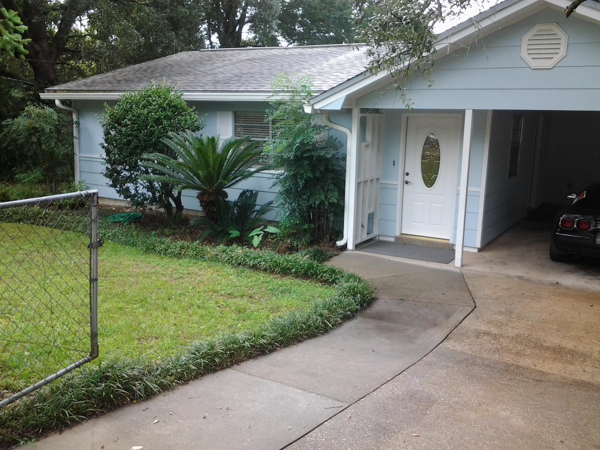 Beautiful setting, Large well landscaped lot and well maintained house. Owner pays for mow and blow of yard. This property is perfect for you. Three carpeted bedrooms, with tile though out the rest of the house. Gas cooktop in the kitchen with built in gas oven and broiler. Refrigerator stays but not warranted. Also washer and dryer available but not warranted. This is a great rental value. Sorry no pets allowed. Available to move in April 15 with an approved application. Rent is $1000/month. All adults intending to live at the property will need to fill out an application and be on the lease.