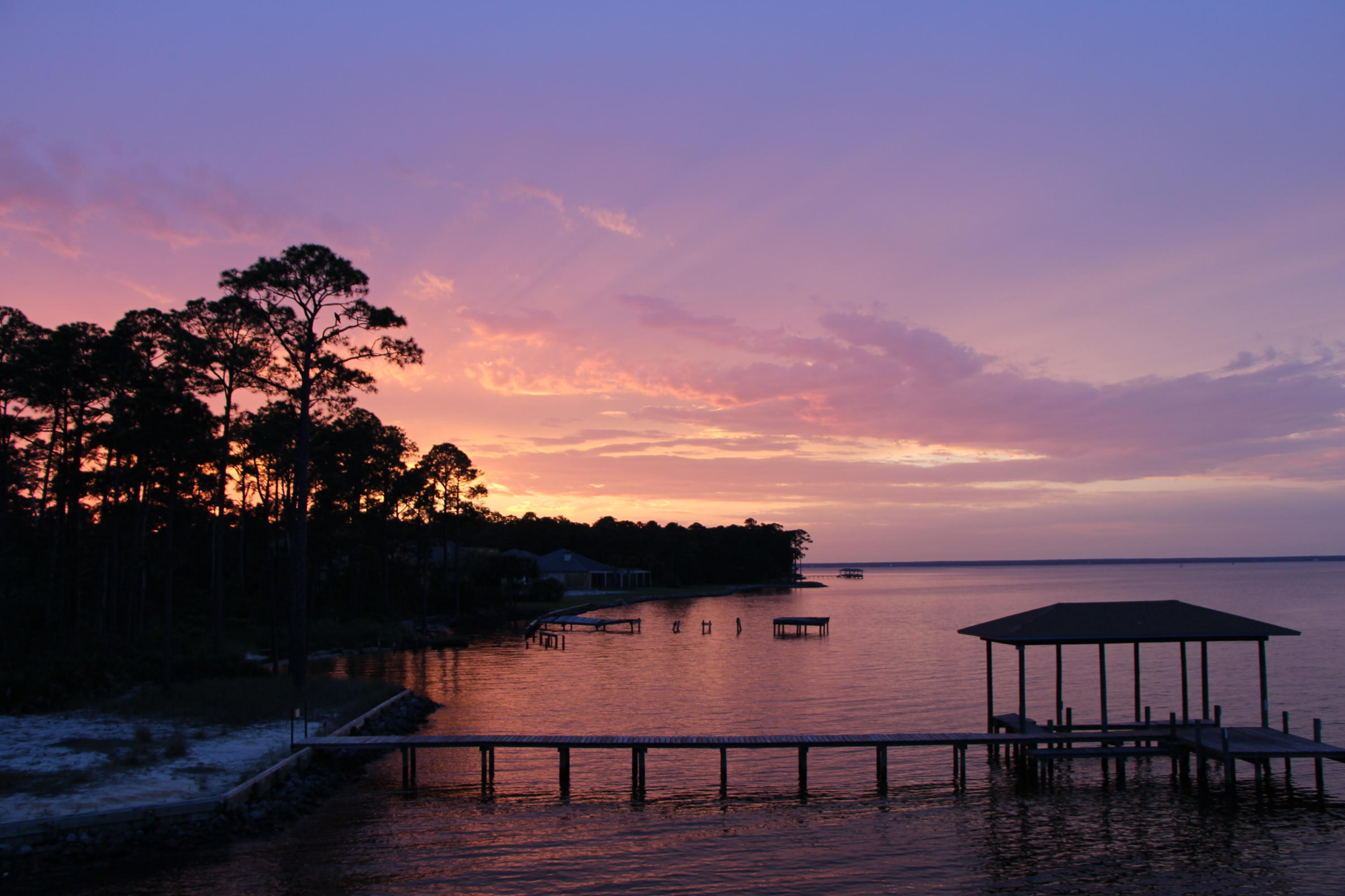Under Contract-SELLER WILL ACCEPT BACK UP OFFERS --SELLER IS MOTIVATED  ---Gorgeous Sunsets await you! Watch the dolphins & the eagles from this beautiful home - custom designed & built. It has too  many smart features & amenities to name them all. Located on a .very lage Bay Front lot , navigable to the Gulf  with 110 water front feet.  
Outside you'll find a beautiful pool & also a hot tub/spa; a trex dock with 2 jet ski lifts & a  boat lift, as well as a fish cleaning station & observation deck - a sturdy seawall; an automatic  irrigation well-  & paver patio, deck, & driveway.
 Inside --spacious rooms with 10' & 12' ceilings & 9' doors-- hardwood, tile, & carpeting; Natural gas stove plus a 2nd built in electric oven; High end stainless appliances; granite counter tops; a huge Florida Room overlooking the water- with built inwet bar that includes a wine frig,  built in ice machine, & kegerator- perfect for entertaining or just enjoying the views & the water opportunities....A Formal dining room, huge living room w/beamed 12' ceiling, a natural gas fireplace & built in book cases; Oversized Master Bedroom has a pool & bay view; 2 very large walk in closets with built in organizers; Master bath has separate his & hers grantite topped vanities, garden tub, very large shower, & lots of storage. The split bedroom floor plan has 3 separate bedroom wings. The back wing has a private bath, & is perfect for guests, parents, or teens. All of the additional bedrooms are larger than average bedrooms. All have large closets.  The laundry room is bigger than some bedrooms & very efficiently organized. The washer & dryer convey with the house. And finally -- there's an automatic generator that accommodates the whole house & appliances as well as the dock & pools . It automatically turns on after the power goes off & runs off of natural gas. How great is that! Also dual HVAC systems & a Rinnai instant hot water system.  Being custom designed, the house has extra touches everywhere . No expense was spared-- everything is quality first class & has been expertly  maintained. Just a few minutes from the beaches & Sandestin's shops & restaurants. Call for an appointment to view this one.  If you've viewed it before, circle back & make an offer.  Proof of Funds or Pre-Approval Letter required PRIOR TO SHOWING..- All measurements are approximate. Please measure if important.