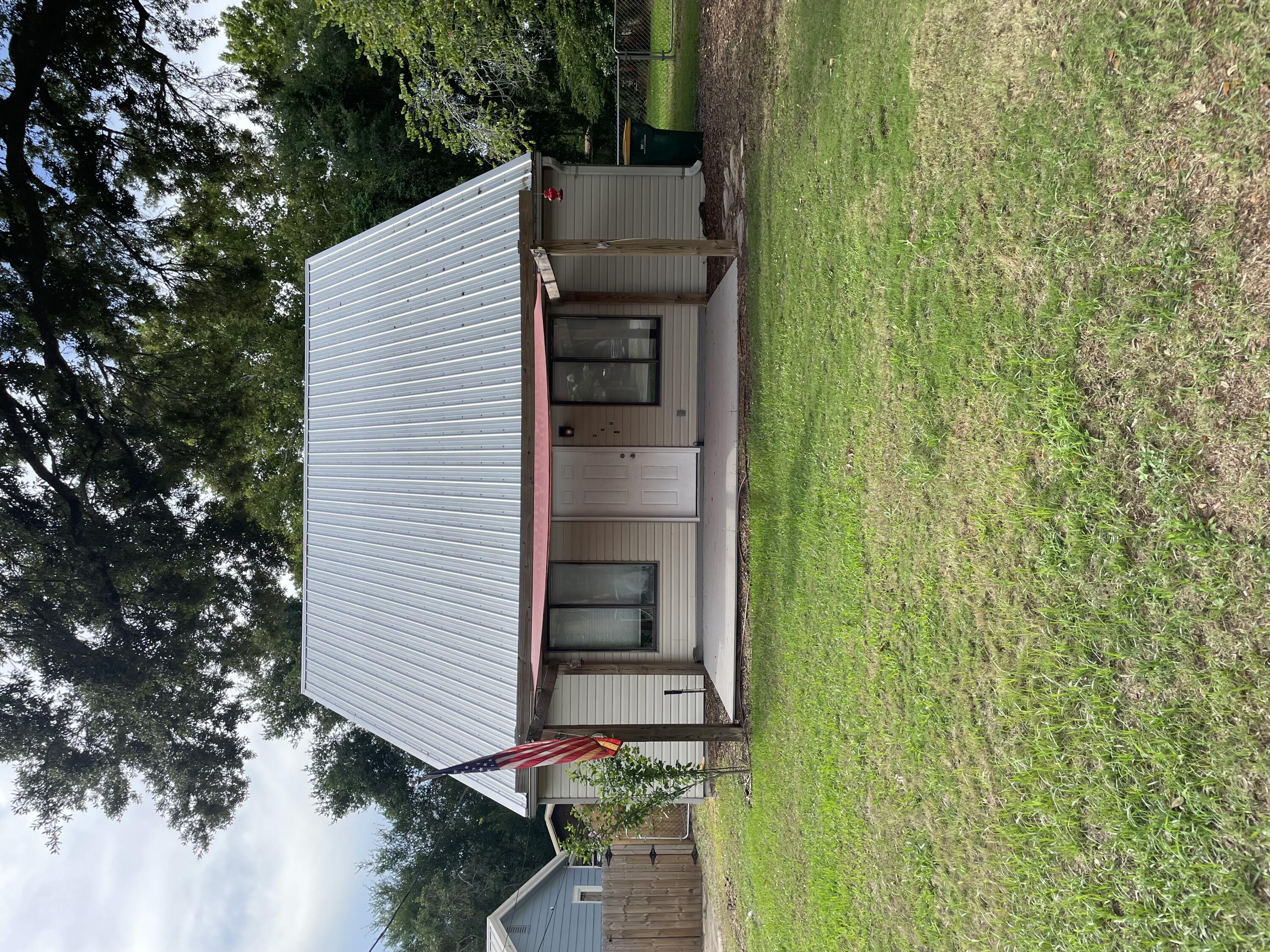 Wonderful open floor plan home; 2 bedrooms upstairs with jack-n-jill bathroom; Master bedroom downstairs; lots of storage area under the stairs; separate laundry room at the back of the house; Great location - Taylor Park off Calhoon (playground/swimming), Joes Bayou Boat Ramp just East of the house.  Elementary school is just .5 miles away.  Trash included in the rent.  No ice maker.
PLEASE CALL BARBARA AT 850-863-3191 FOR MORE INFORMATION OR TO VIEW THE PROPERTY.