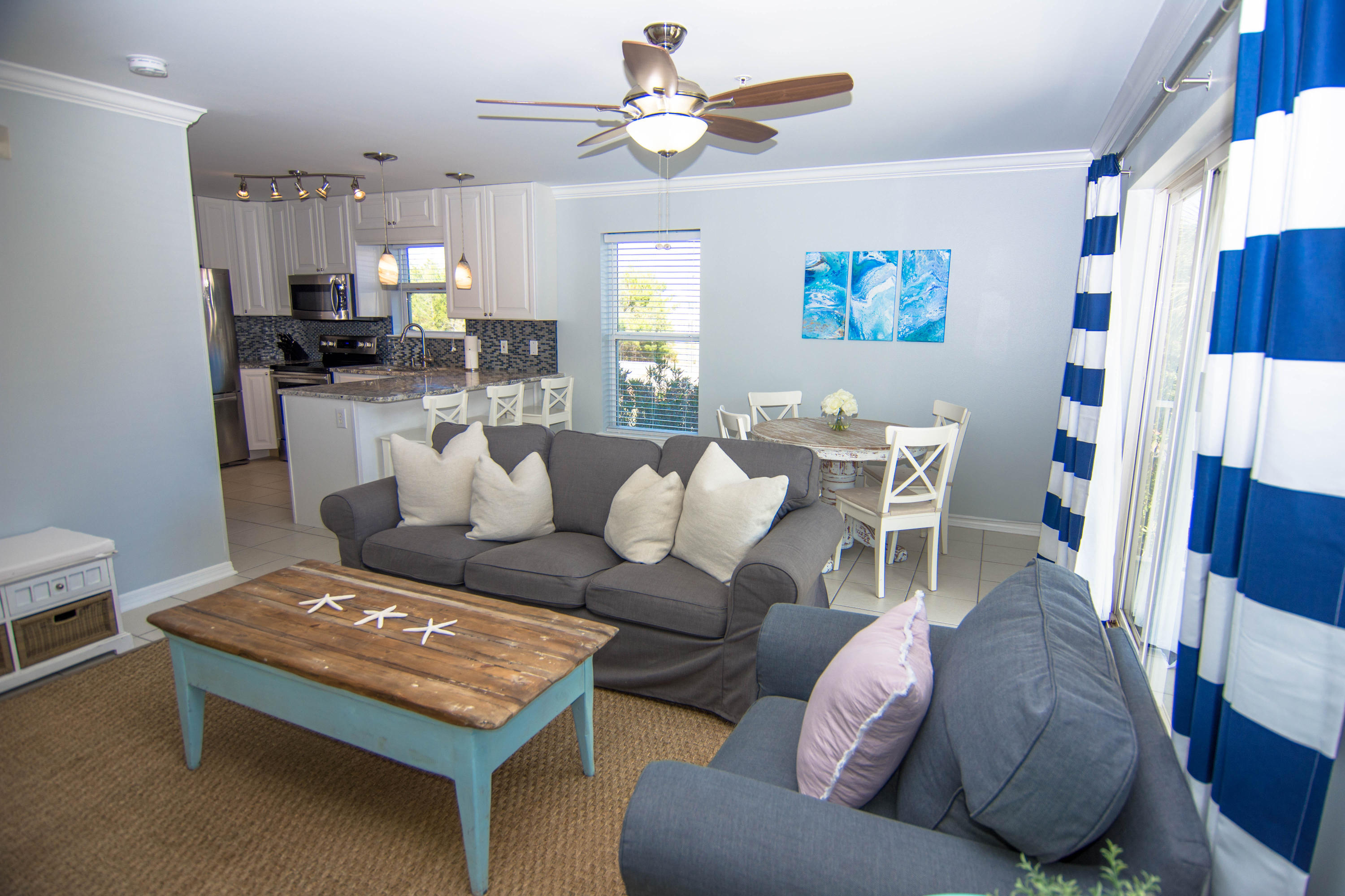 Step inside this second floor, fully remodeled 3 bedroom condominium in the coastal community of Rollin' Tide Villas! You will find an exquisite, gourmet kitchen complemented with the most beautiful granite counter-tops & stainless steel appliances. This condo is your ultimate beach paradise, furnished throughout with new furniture, beds, and bedding. Upgrades include crown molding, smoothed ceilings, and much more.Take a short stroll down to a public beach access or hop downstairs for a dip in the community pool!