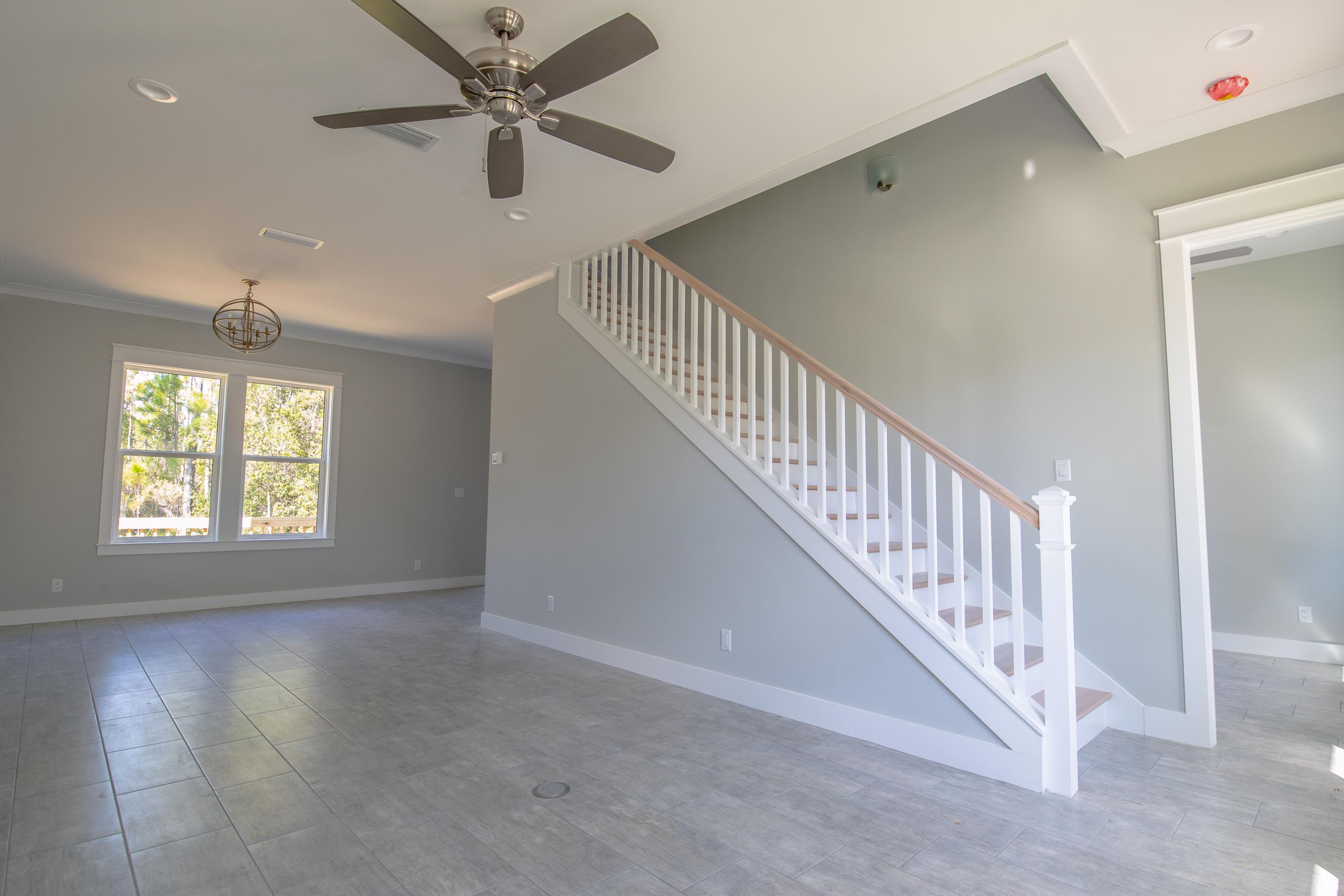 Brand New Custom Home SOUTH OF 98. Location and Value are second to none! Ideal location in the 30a Scenic Corridor. Take a walk to the beach or hop in the car and within 5 minutes be to world class shopping/dining. Not only are you South of 98 which allows for uninterrupted walks to the Gulf of Mexico, but your house backs up to the Point Washington State Forest! That's right, you have the beach and State Forest at your fingertips. Builder spared no expense with Impact Windows and Doors, 10 Foot Ceilings, Custom Cabinets, Custom Tilework, Glass showers and advanced Media Wiring are just a few things that set this house apart from the rest. No Flood Insurance required. Click ''MORE'' for detailed information! Walking into the house you are met with a large open floor plan and 10 foot ceilings! Upgraded Media wiring and LED Lighting in every room. "Shaker style" Millwork and 8 foot doors throughout, quality is everywhere you look.

The master bath features double vanities, Large soaker tub, Frameless Glass Shower, Walk-in closet and shaker cabinets with soft close doors, topped off with beautiful natural stone countertops.

Large kitchen with Custom, Soft close cabinets, Gas Range, Side by side refrigerator, Microwave and Dishwasher. All Appliances are Kenmore Stainless Steel.

The home features 2x6 exterior wall construction, which does 2 things. one, it is much stronger than a conventional framed house and two, the thicker walls allow for better insulation which also reduce the utility bills.

This roof has an advanced Peel and Stick Waterproof membrane which can save a considerable amount in regards to home owners insurance. 

If you are looking for one of the best built homes south of 98, this home will not disappoint!