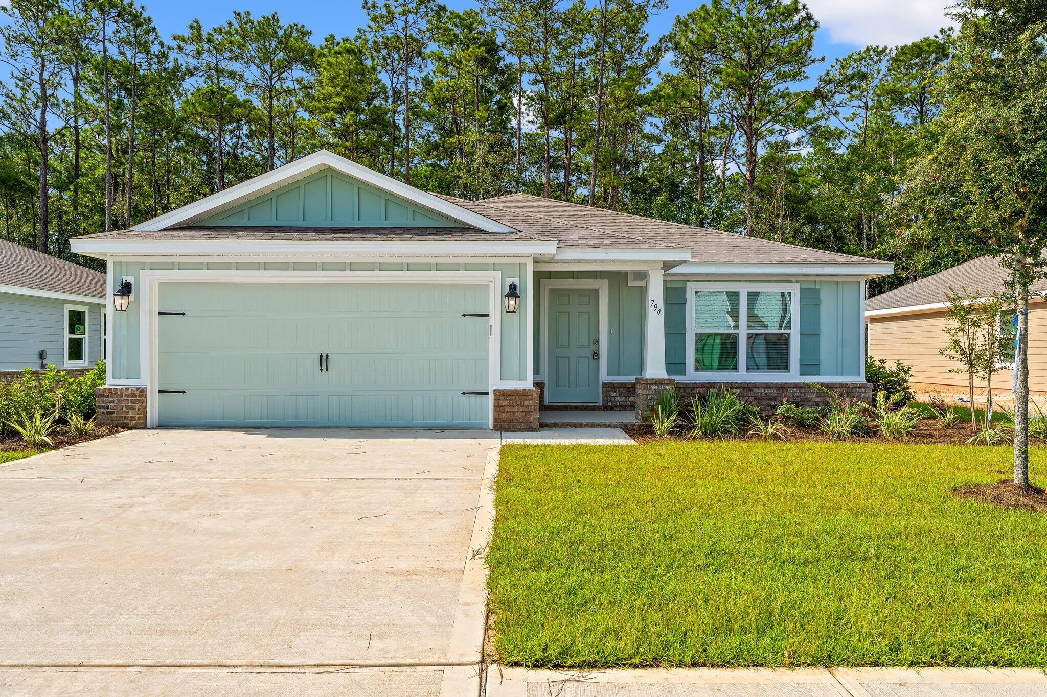 Welcome to this beautiful 3 bedroom, 2 bath home in Freeports newest neighborhood Riverwalk!
This home has a den that may be used as a 4th bedroom, office, school room, formal dining room, etc! Master bedroom features a walk in closet and spacious bathroom with double vanity. Home is complete with stainless appliances, granite countertops, laminate and carpeted flooring and a nice sliding glass door to the wooded view back patio!