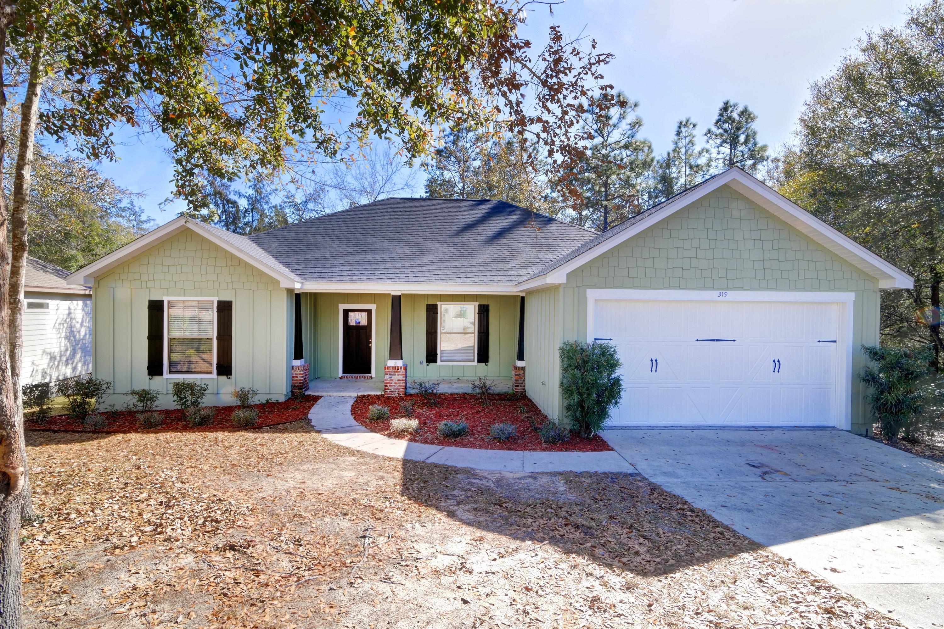 You do not see unique properties like this everyday! Better than new and located in a great neighborhood on a quiet cul-de-sac street on a massive 1.96 acre lot with a beautiful winding creek, this is the perfect retreat! Located in south Crestview, this 4 bedroom, 2 bath home with a 2 car garage has quick access to I-10 as well as south 85 making it a short drive to Duke field, 7th Group, & Eglin AFB. Just shy of 2 acres, enjoy sitting out on your brand new back deck and enjoy the view, or camp out and fish from your own backyard! This inviting open concept home features a split floor plan with three bedrooms and a bath on one site, and the master retreat on the other allowing for plenty of privacy and space. Featuring double vanities, a separate soaking tub, stand up shower, and walk in closet, this is the perfect place to relax after a long day. New vinyl plank flooring extends throughout, and the kitchen has granite countertops and stainless appliances. Check out the long list of recent renovations and the attached seller's disclosure for more information. Do not miss out on this gem with this perfect location on a lot where the possibilities are endless!