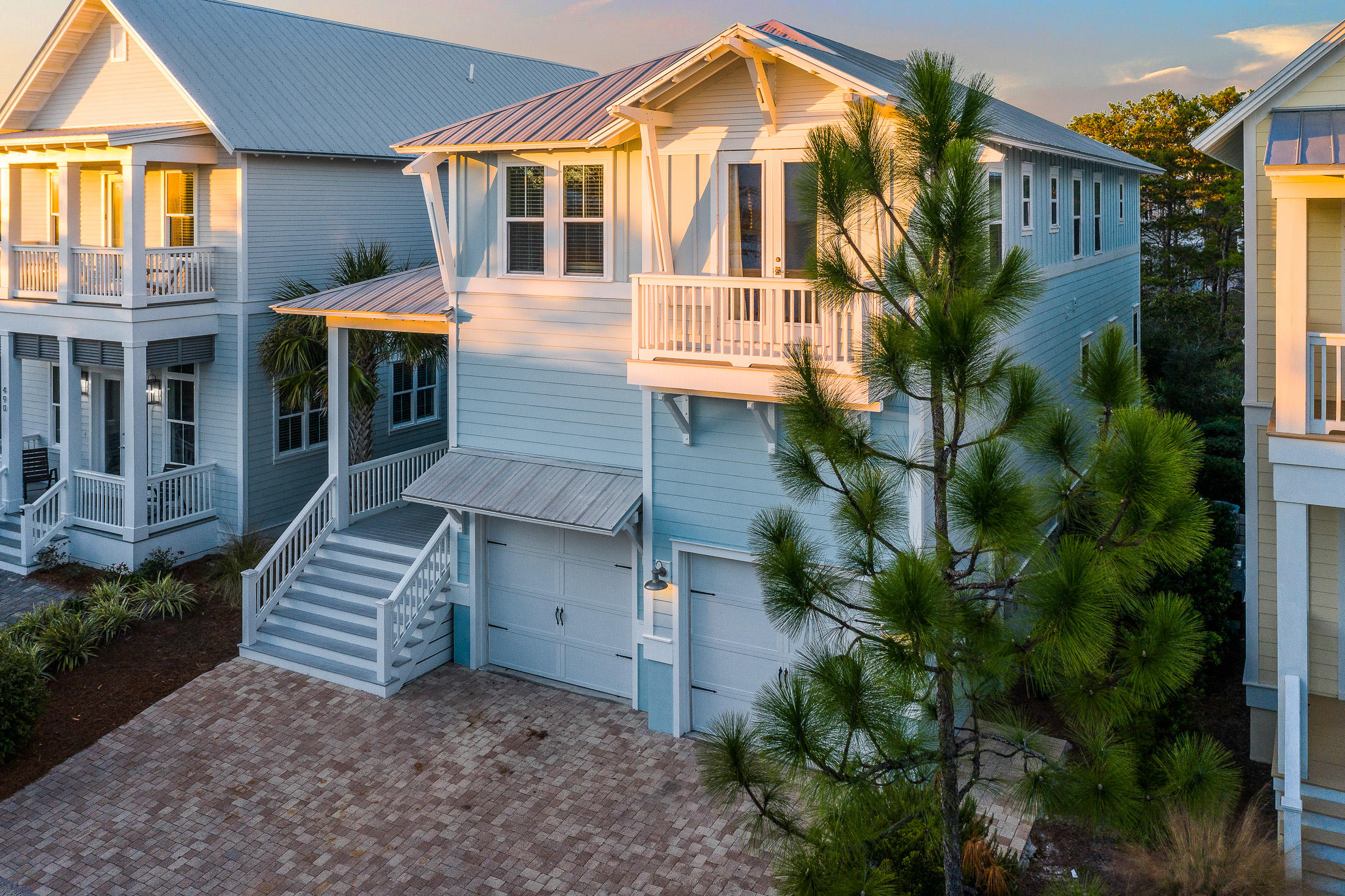 This turn-key, beautifully decorated, very well maintained beach house is perfect for a rental or second home. The open floor plan and sophisticated beach decor make it the ideal spot to relax and enjoy all that 30A has to offer. Located on a premium lot with a pond view and just steps from the incredible resort-style community pool. 
The first floor provides a very open floor plan with ample room for entertaining, dining, and unwinding from a day at the beach. There is also a screened in porch to enjoy the cool nights. Upstairs you will find a spacious master suite and three guest bedrooms. The master bedroom also has a private screened in porch. The oversized garage is the perfect place for your vehicle, golf cart, beach gear or all of the above.