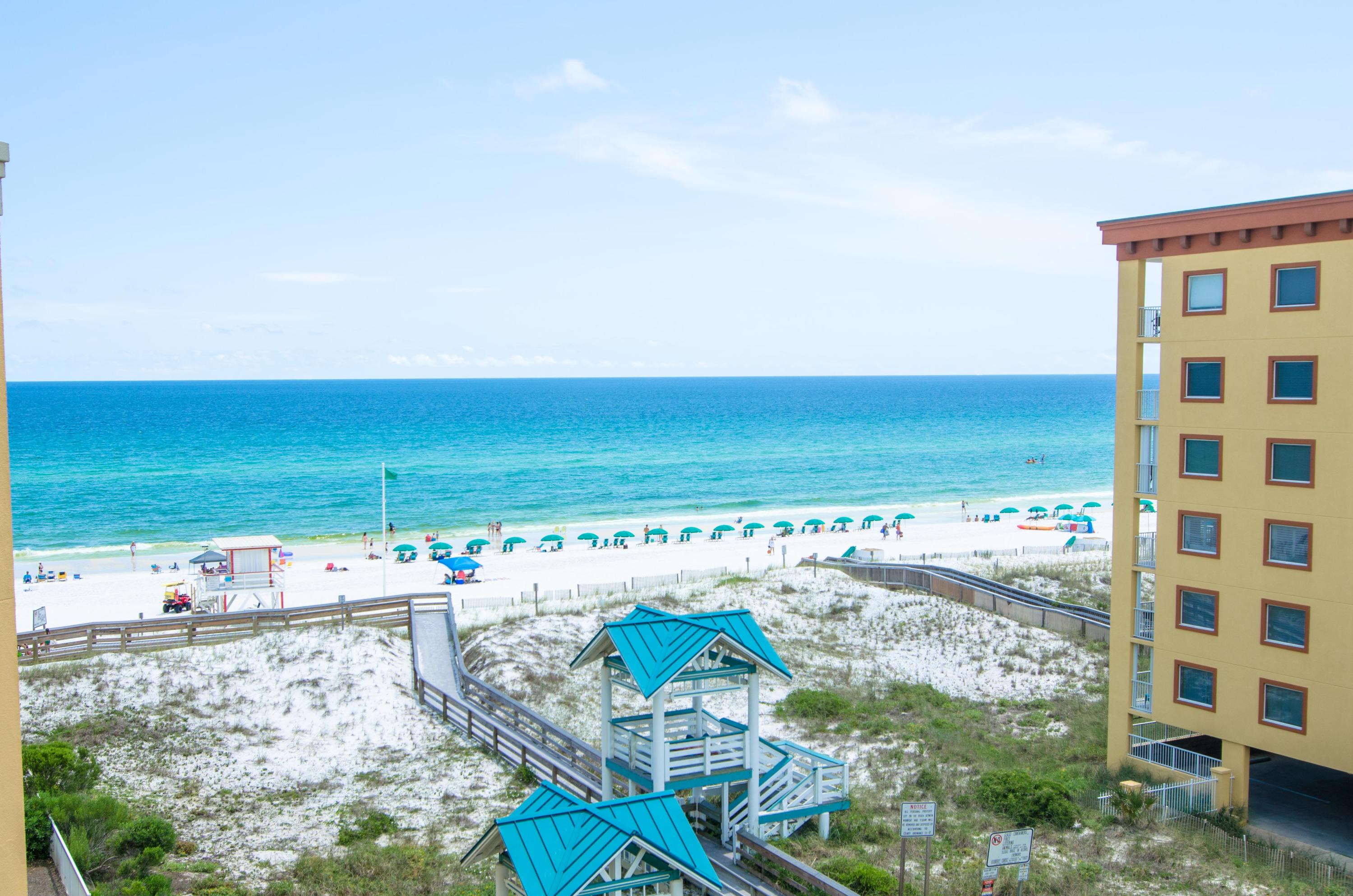 A stunning coastline view is yours in this glorious 3 bedroom condo at Azure! Upgrades include tile floors, stainless steel appliances, granite counters, beautiful furnishings and a large balcony to soak in all the views. The Master Suite is Gulf front and has balcony access plus a spa-like bath with soaking tub, separate shower and his/her closets. This condo is a rental powerhouse, grossing up to $50K! Enjoy the resort style amenities at Azure including 2 pools, 2 hot tubs, a spray park, fitness center and a large boardwalk to access the beautiful beach. This is a turn-key property  all furnishings convey!
