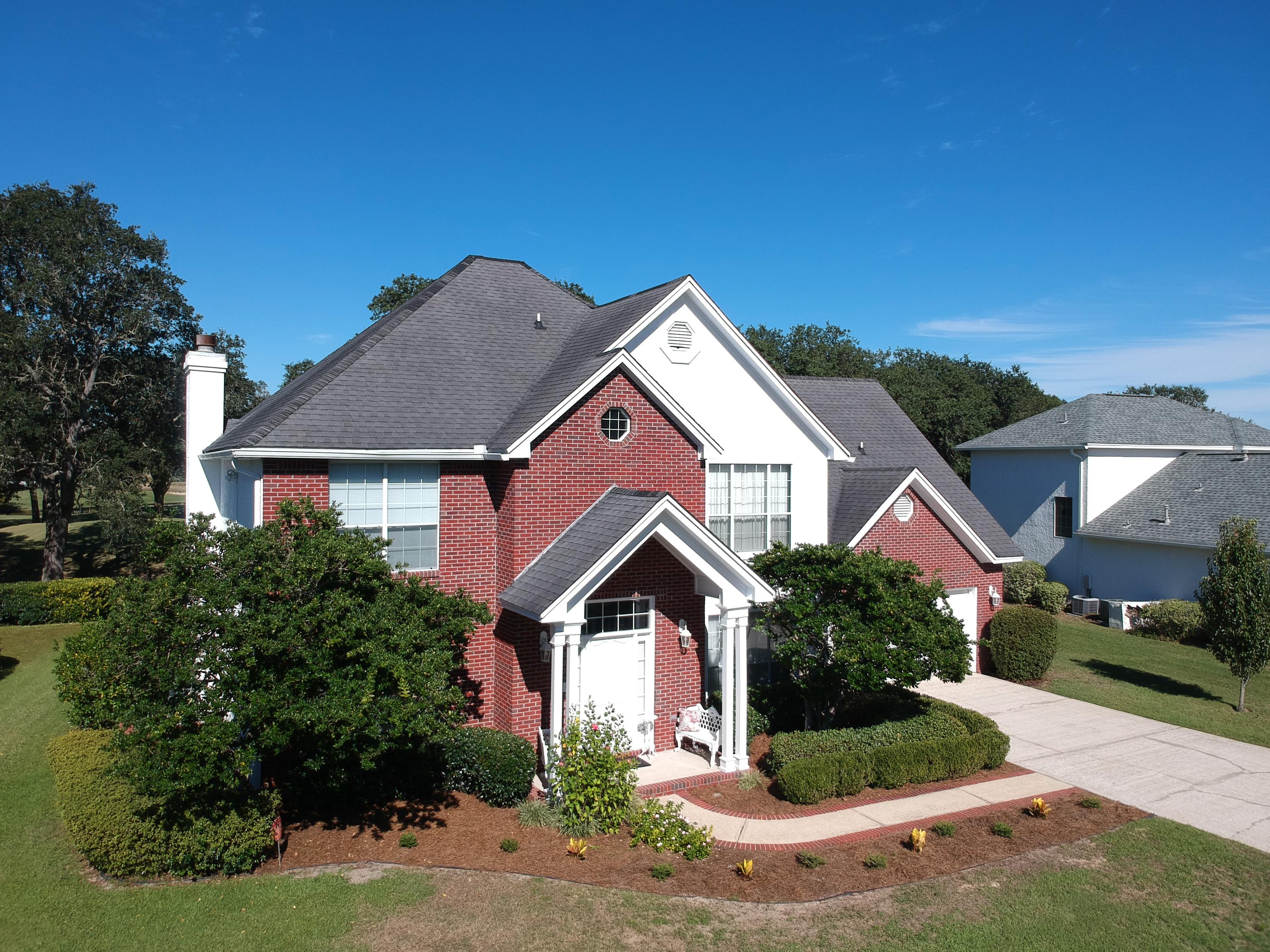 This classically built and traditionally styled home in Shalimar's exclusive gated community - Shalimar Pointe - sits along the golf course with a backyard patio that affords direct views of the 10th green. The home features a wet bar in the living room; a secondary den that could be utilized as an office; and all four bedrooms are on the second floor of the house - including a luxurious oversized master bedroom suite. Easy access to the Shalimar Pointe golf course and tennis club. Take advantage of the opportunity to live in a quiet, gated community with ample opportunity to enjoy the outdoors before retreating inside to relax.